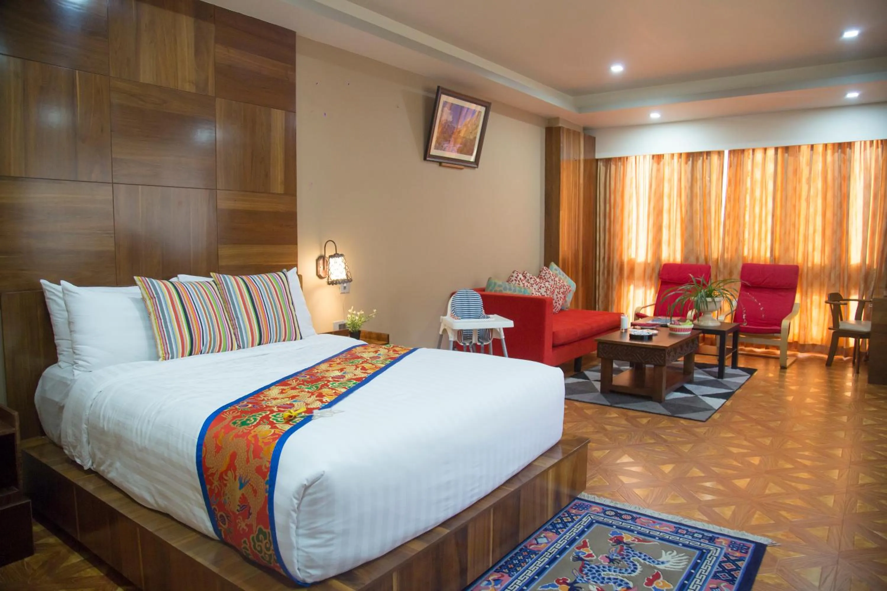 Living room, Bed in Tara Phendeyling Hotel