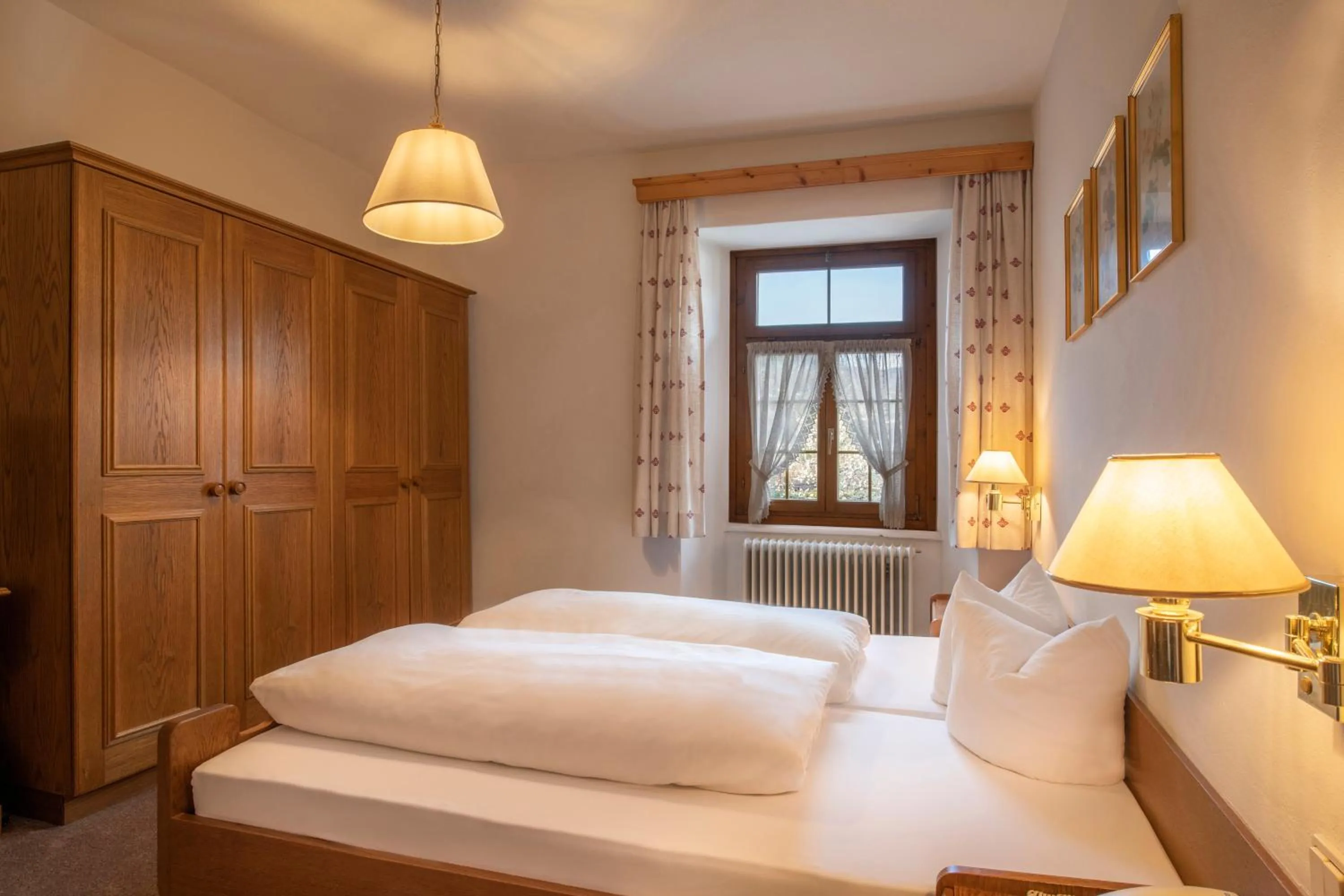 Photo of the whole room, Bed in Gasthof Löwen by Hotel Montafoner Hof