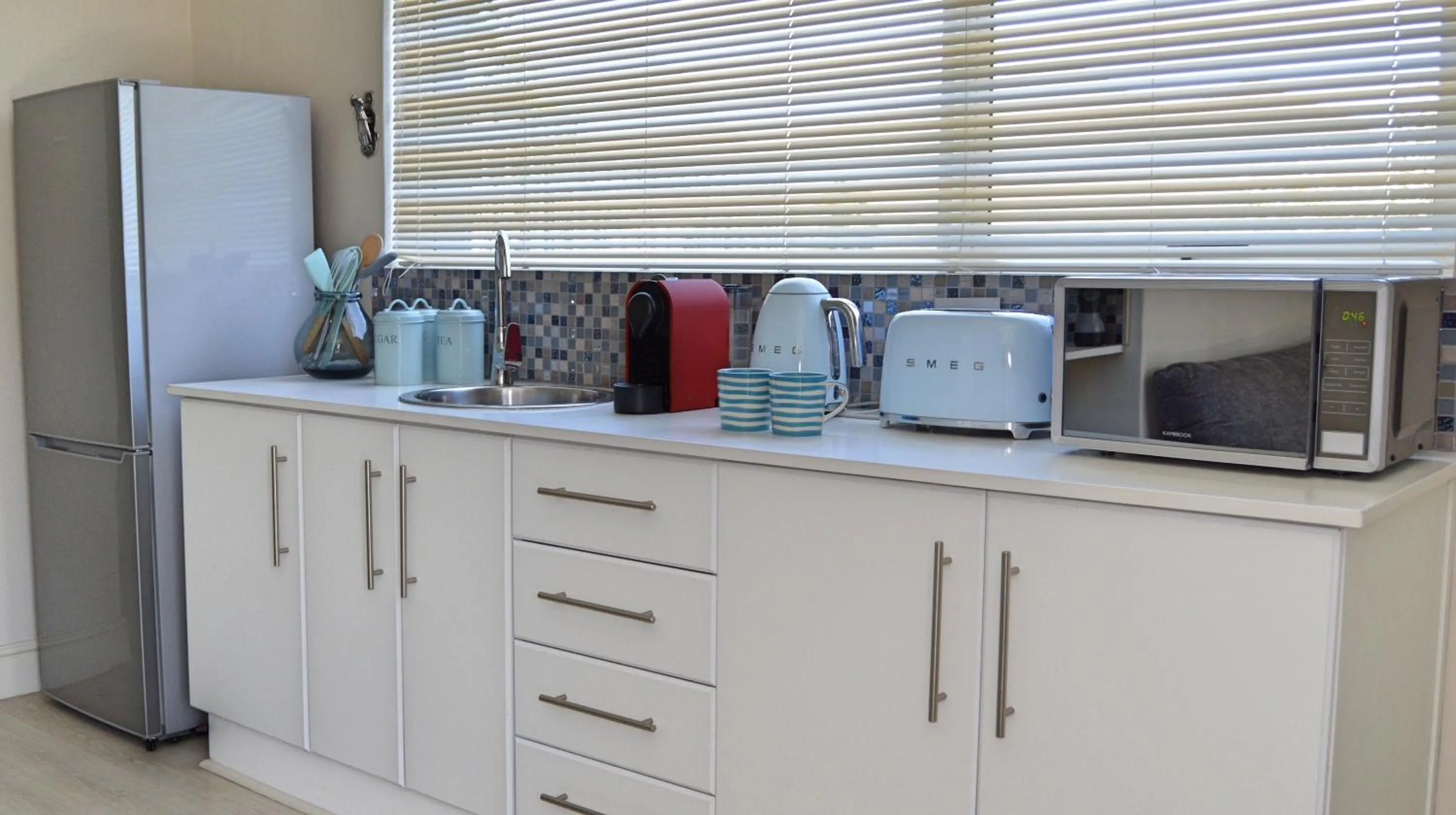 Kitchen or kitchenette in 1AA Wilhelmina Luxury Suites