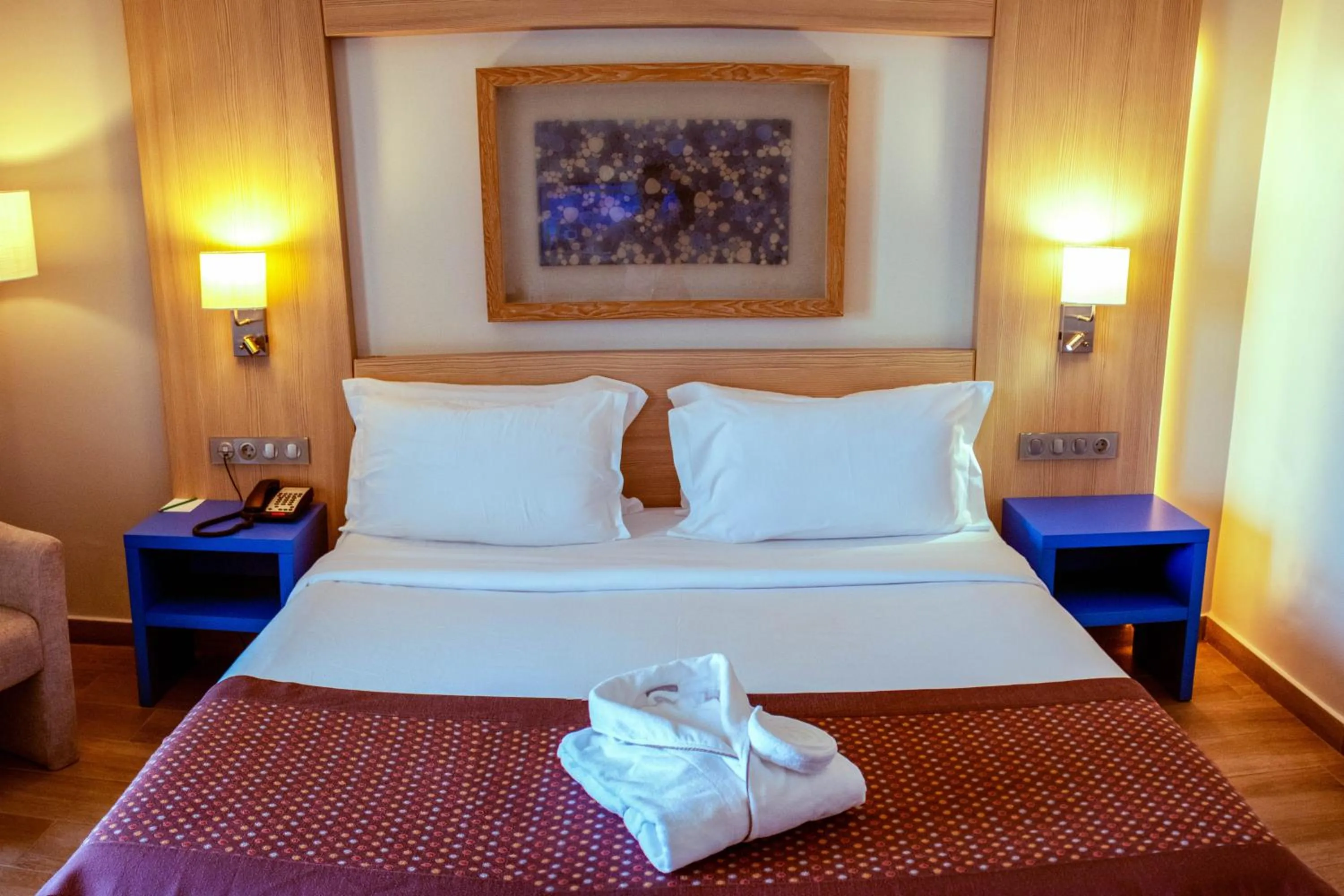 Photo of the whole room, Bed in Golden Tulip Le Diplomate