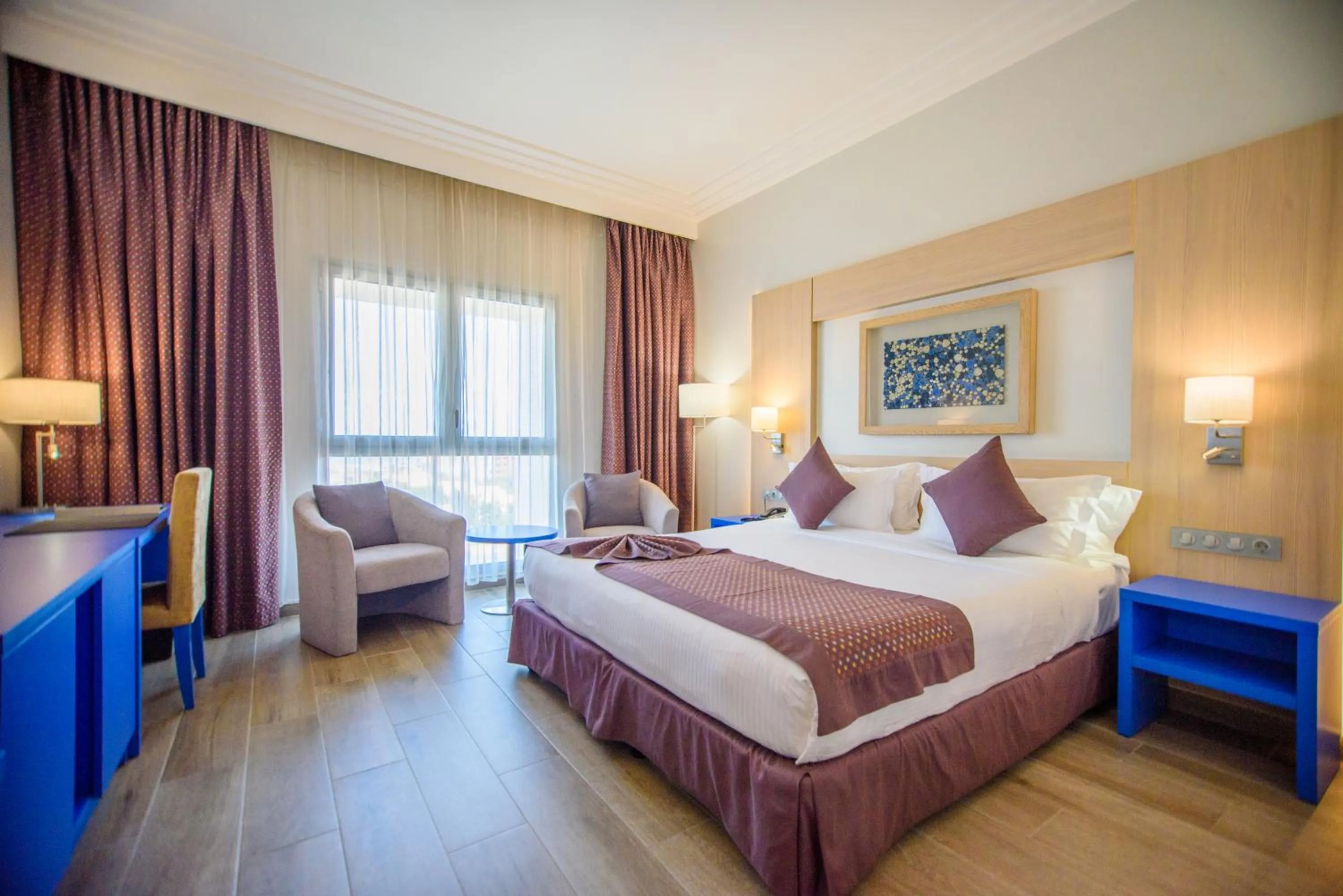 Photo of the whole room, Bed in Golden Tulip Le Diplomate