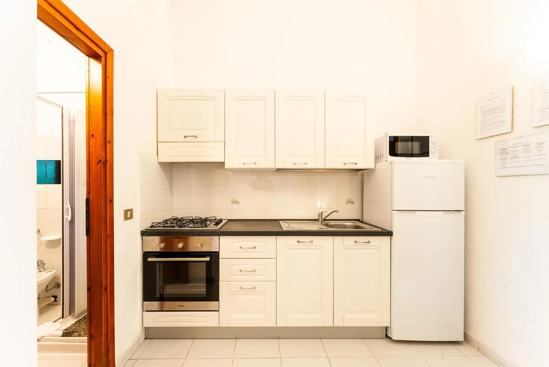 Kitchen or kitchenette in Residenze Gallura