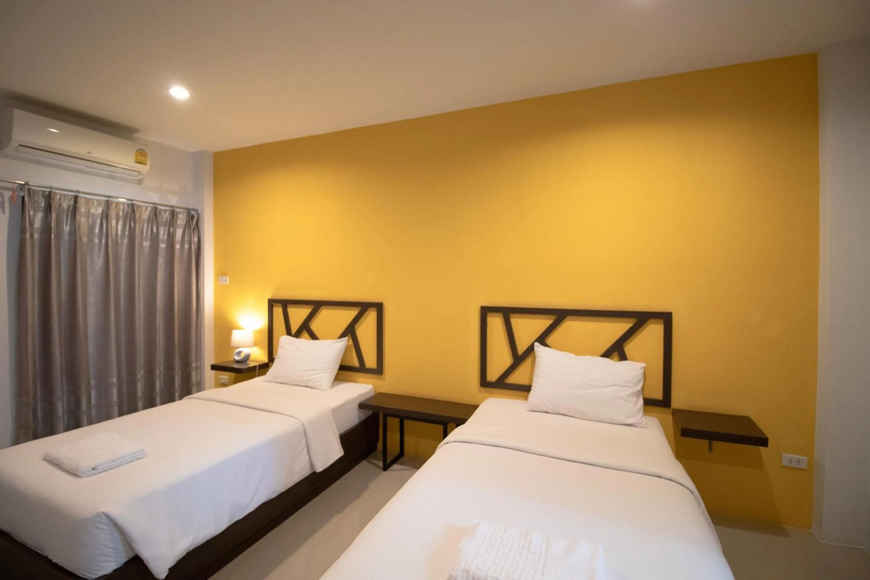 Bedroom in Somsamai Style Apartment