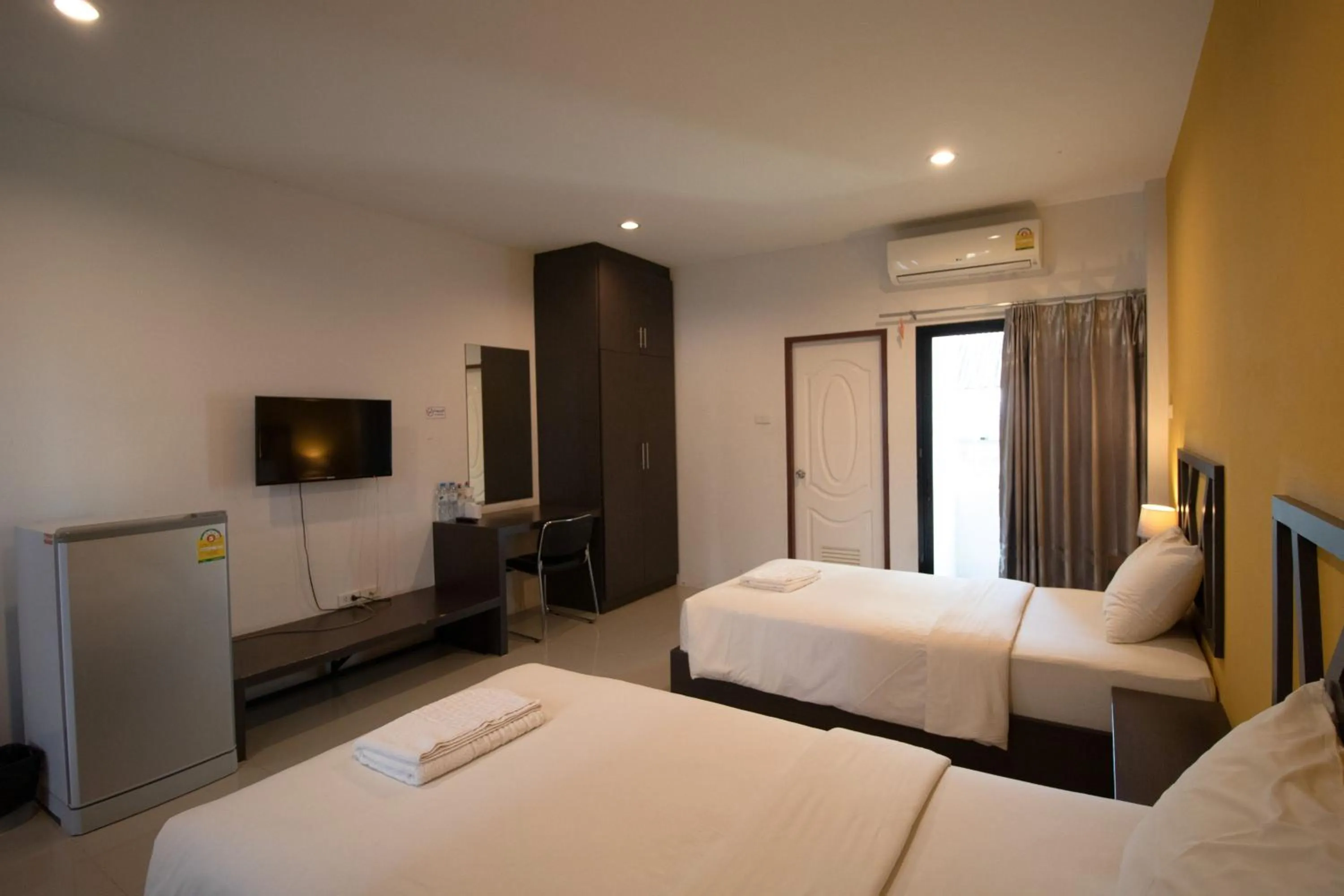 Bedroom in Somsamai Style Apartment