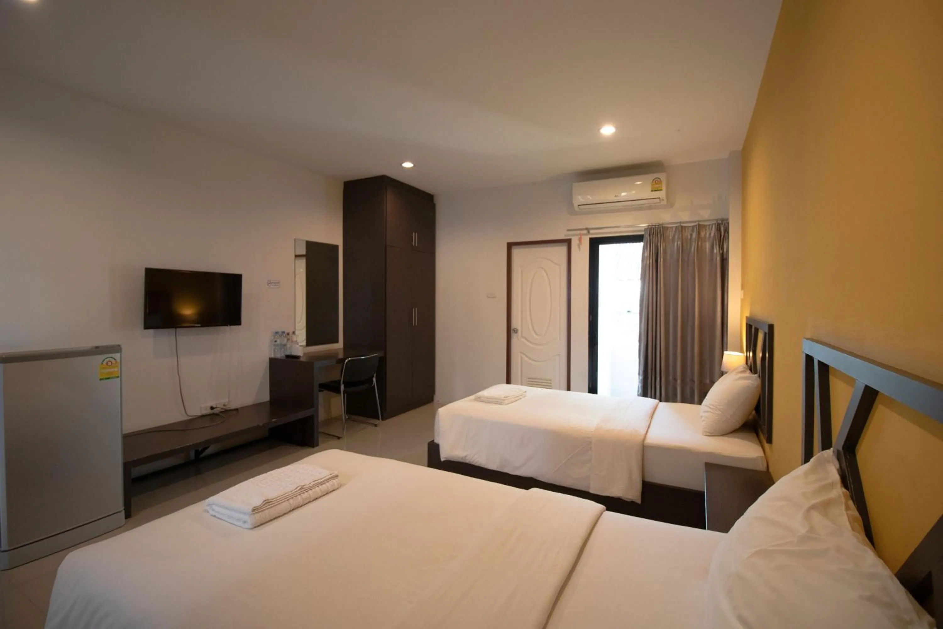 Bedroom in Somsamai Style Apartment