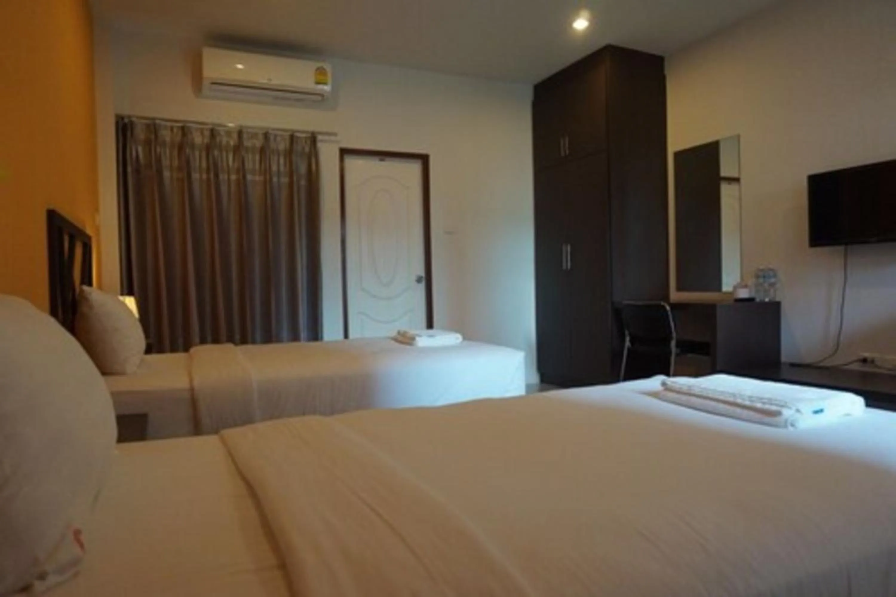 Bedroom in Somsamai Style Apartment