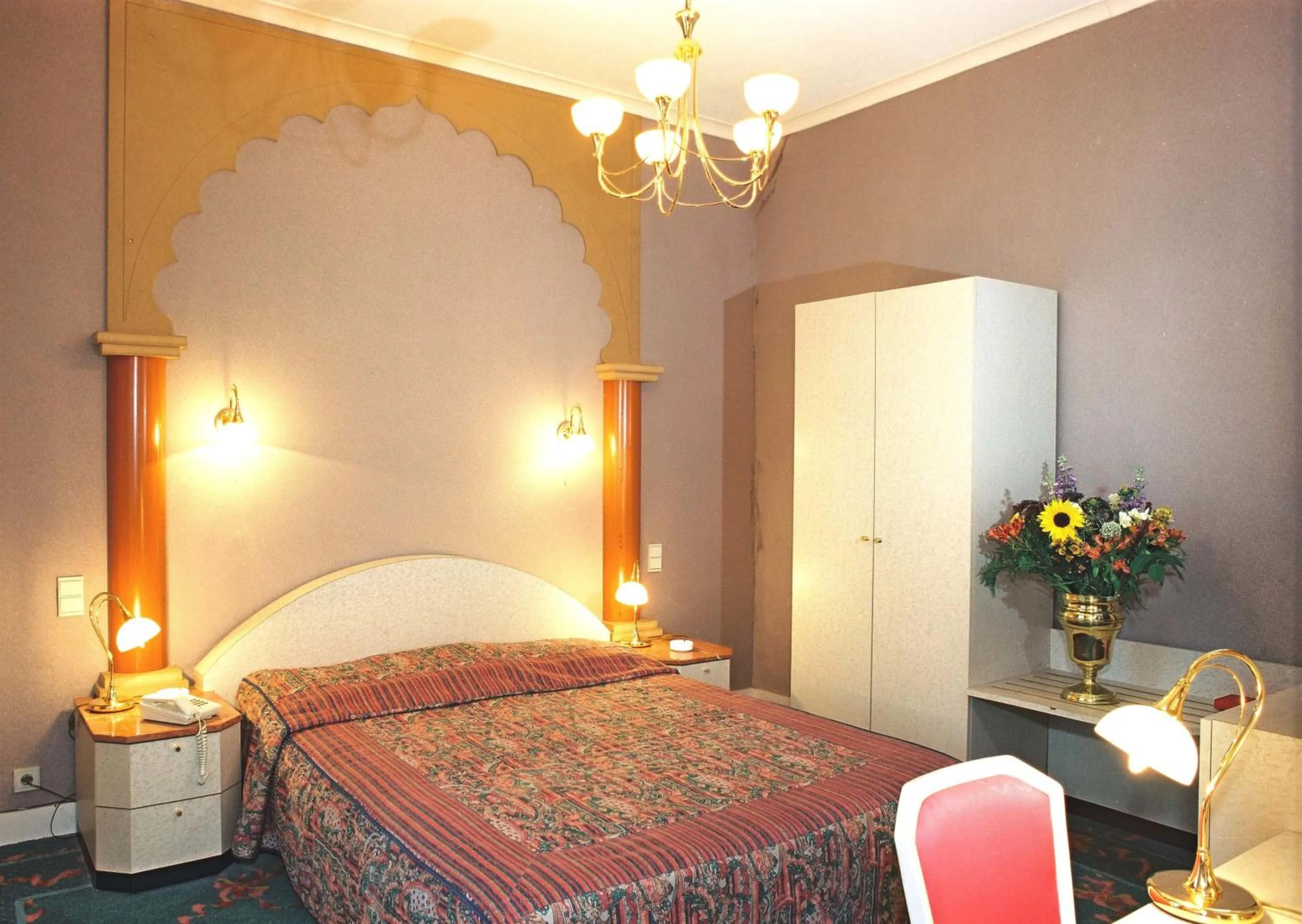 Bed in Hotel L'auberge Du Souverain