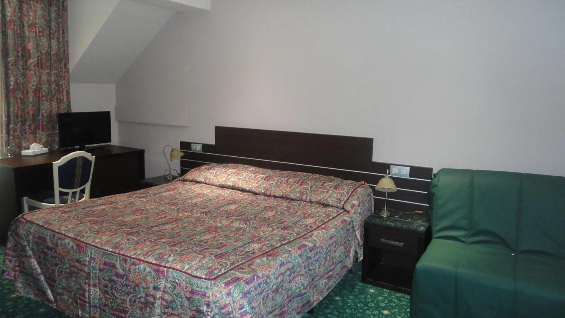 Bed in Hotel L'auberge Du Souverain