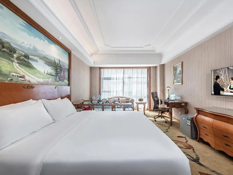 Bed in Vienna International Hotel Xinyang Yangshan New District
