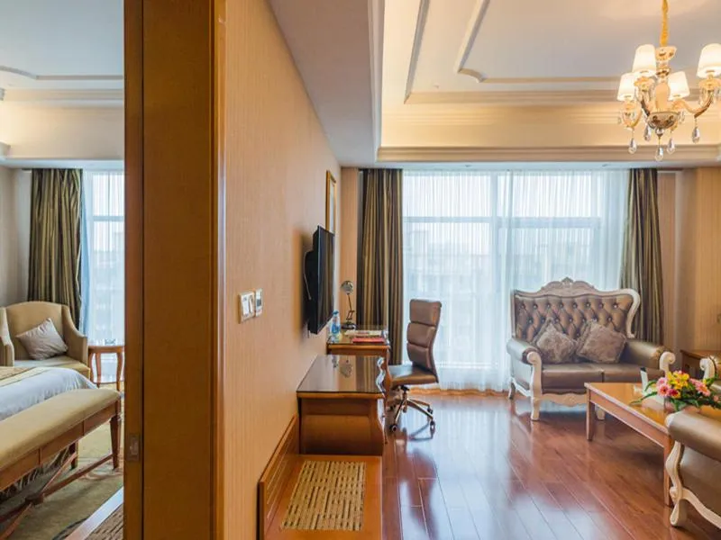 Bed in Vienna International Hotel Xinyang Yangshan New District