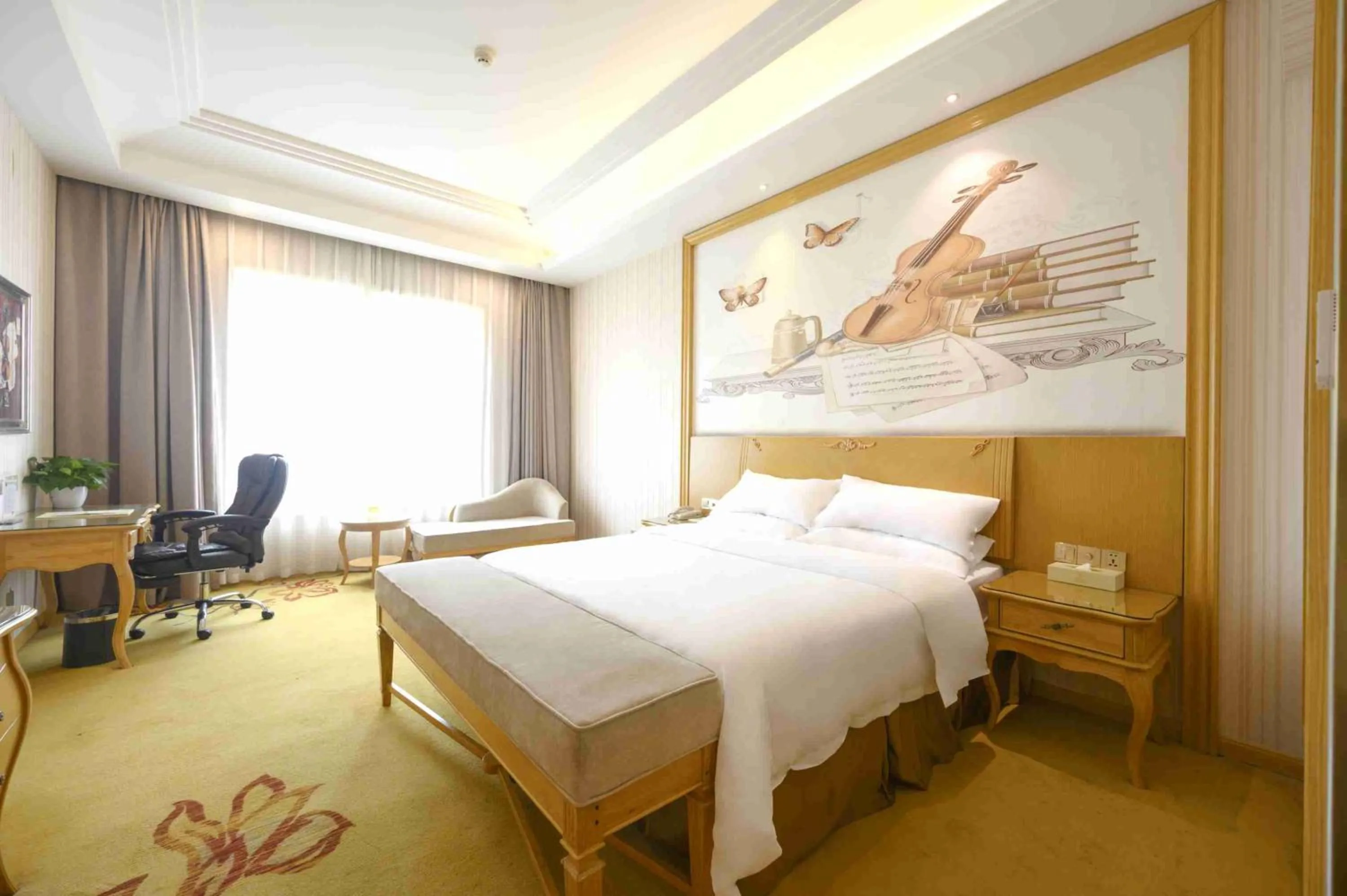 Bed in Vienna International Hotel Shanghai Malu Station