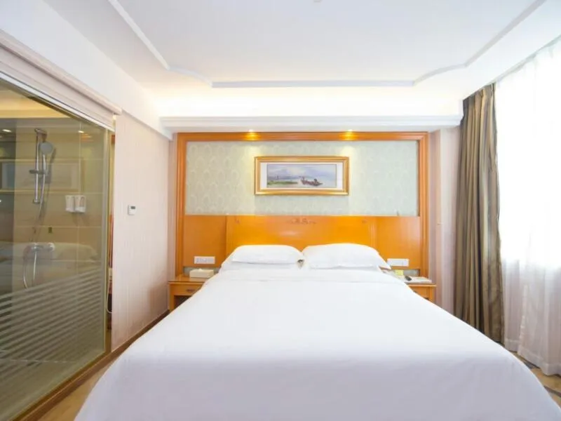 Bed in Vienna Hotel Guangzhou Nanpu Station