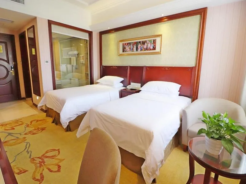 Bed in Vienna Hotel Shanghai Hongqiao National Convention Centre