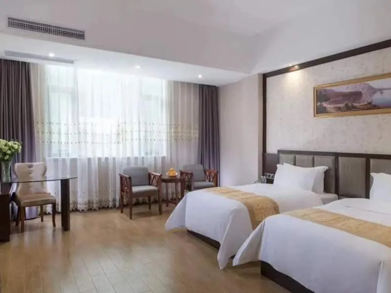 Bed in Vienna International Hotel Jieyang Chaoshan Airport