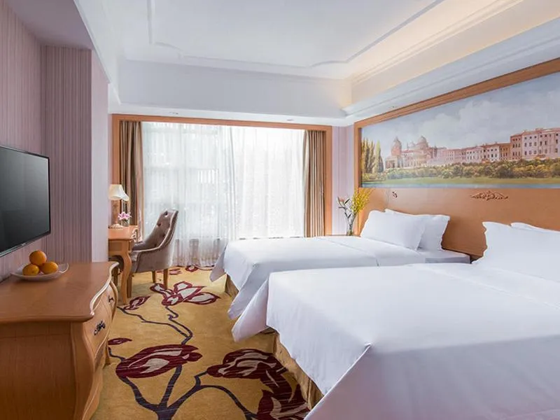 Bed in Vienna Hotel Shenzhen Unitown