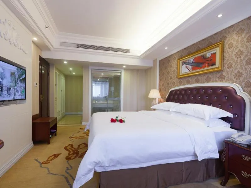 Bed in Vienna International Hotel Nanning Zoo