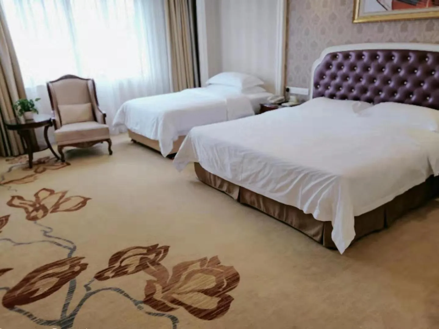Bed in Vienna International Hotel Nanning Zoo