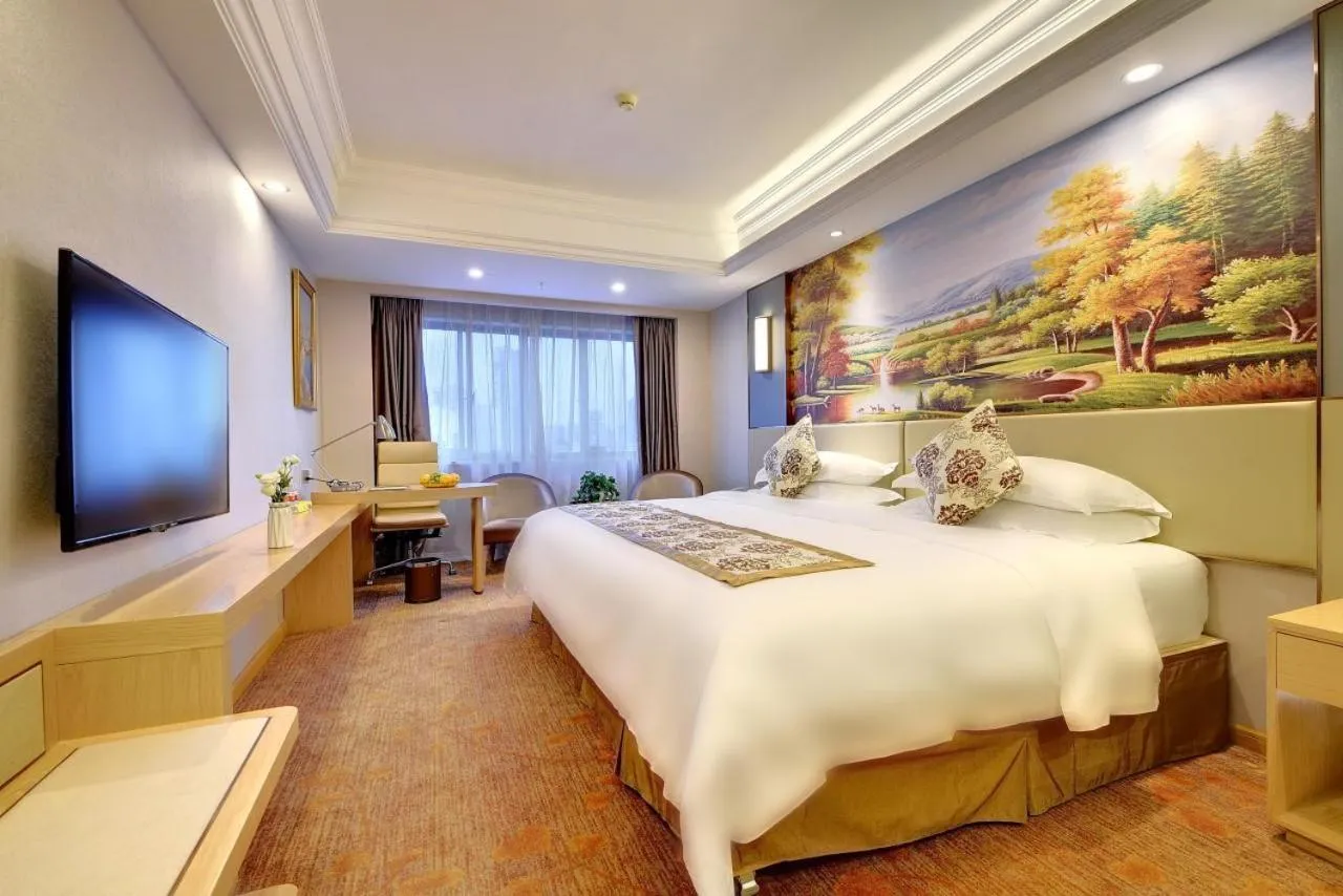 Bed in Vienna International Hotel Nanning Zoo