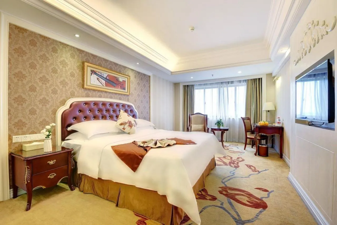 Bed in Vienna International Hotel Nanning Zoo