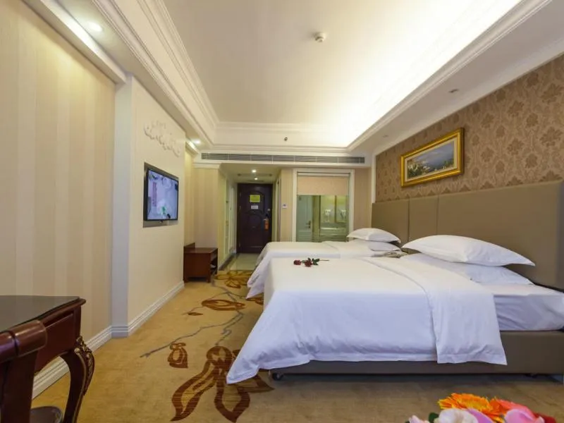 Bed in Vienna International Hotel Nanning Zoo