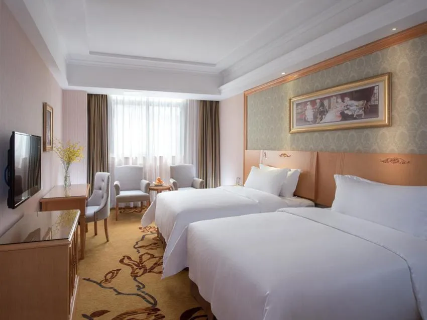 Bed in Vienna Hotel Shenzhen Buji Ganli Road