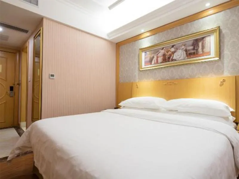 Bed in Vienna Hotel Shenzhen Buji Ganli Road