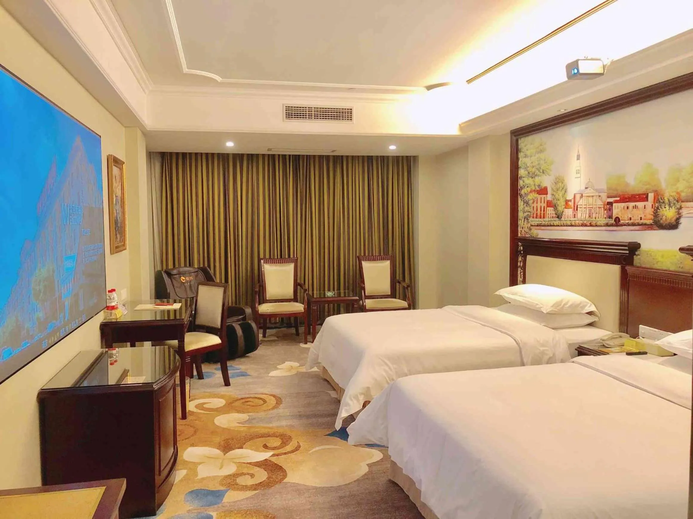 Bed in Vienna Hotel Guangzhou Shiling