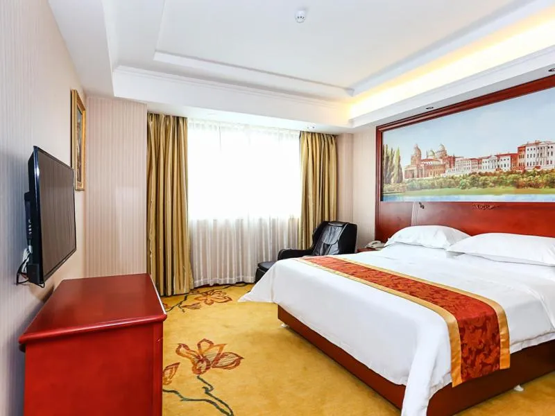 Bed in Vienna International Hotel Shanghai Fengxian Nanqiao