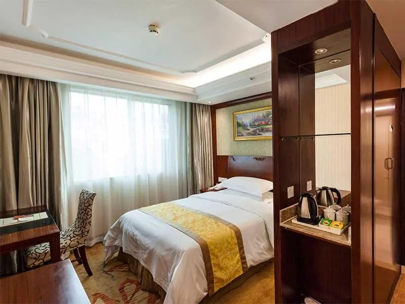 Bed in Vienna Hotel Nanjing Longjiang