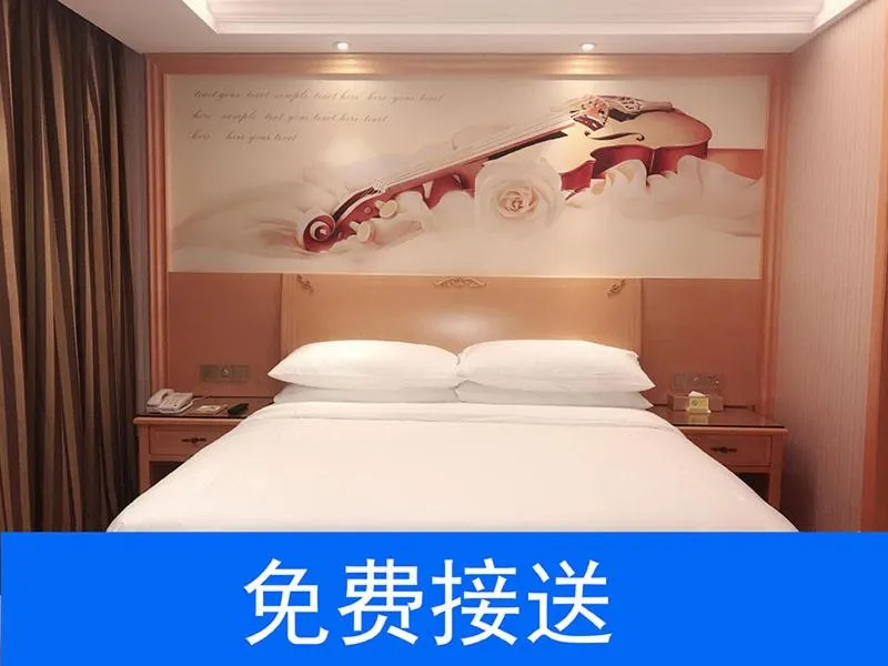 Bed in Vienna Hotel Guangzhou South Railway Station