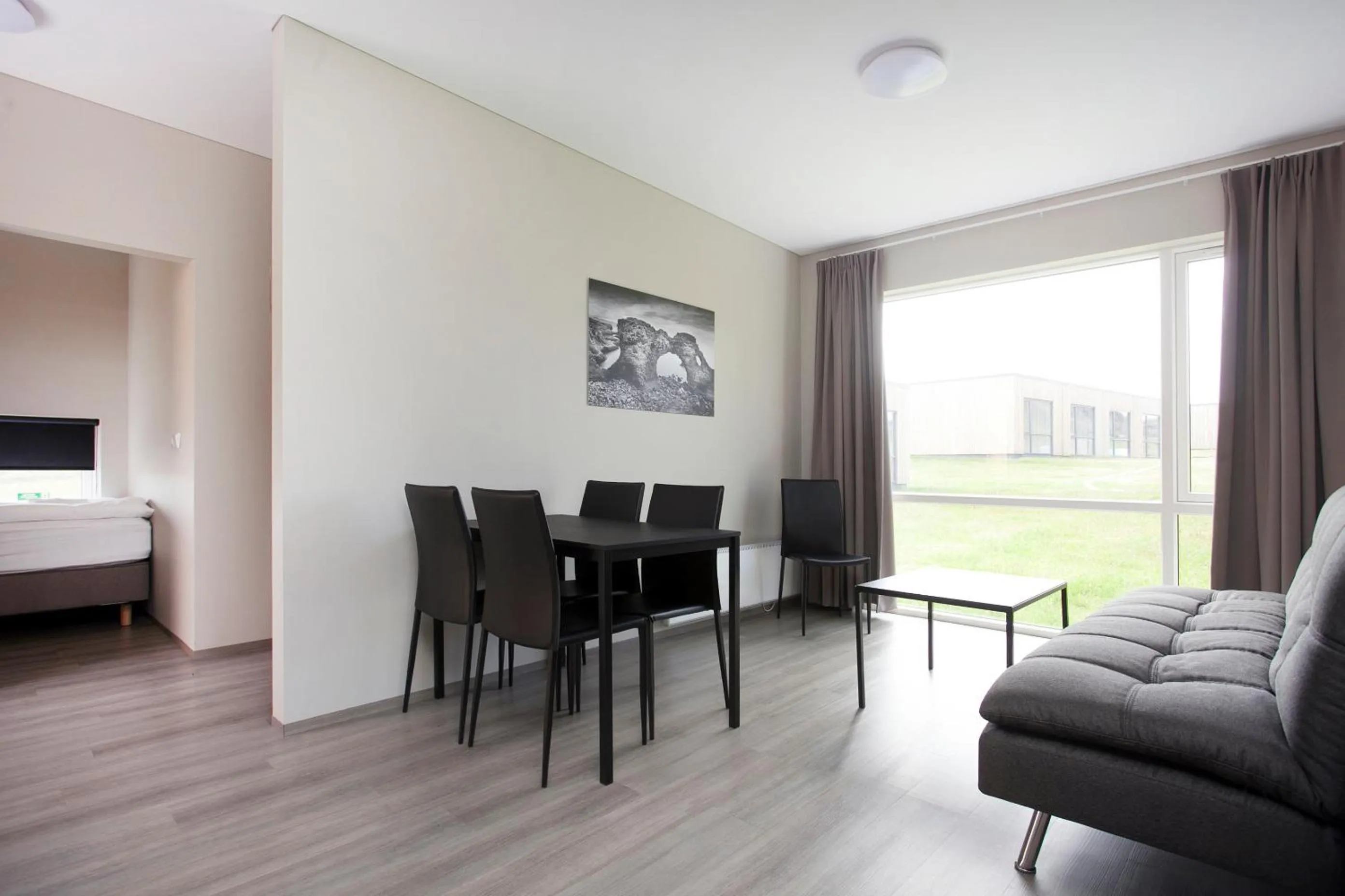 Living room, Bed in Arnarstapi Hotel