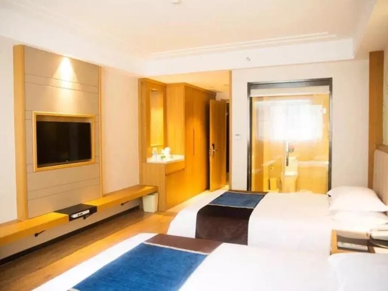 Bed in GreenTree Inn JiangSu Taizhou Taixing Middle Guoqing Road Business Hotel