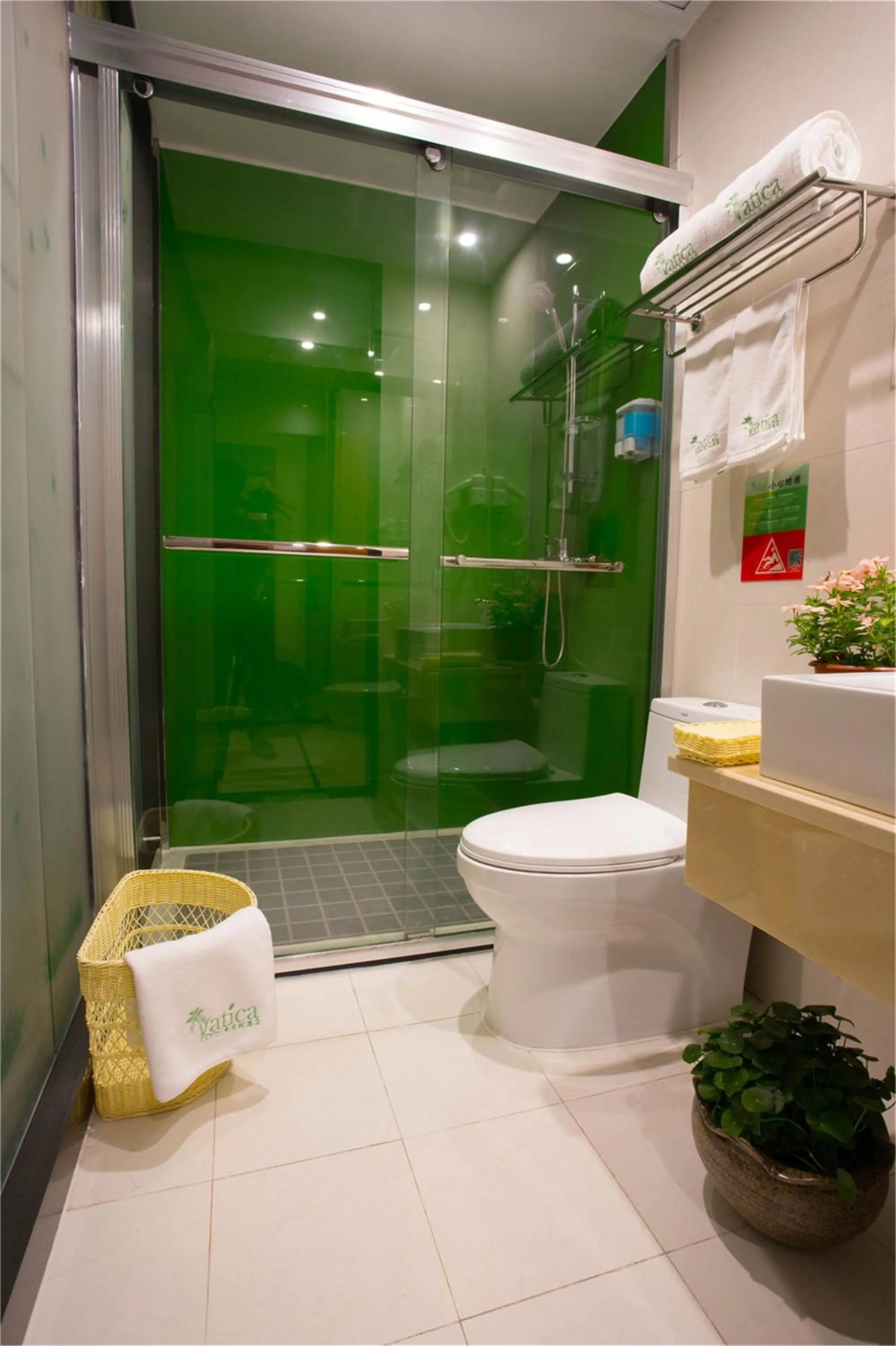 Bathroom in GreenTree Hospitality Group Ltd Vatica Jiuquan West Han Shengsheng Shengshi Hotel
