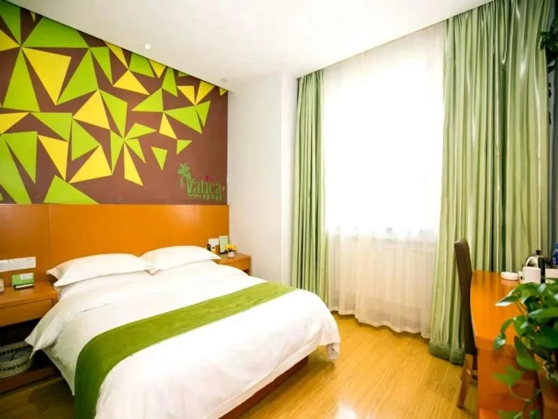 Bed in GreenTree Hospitality Group Ltd Vatica Jiuquan West Han Shengsheng Shengshi Hotel