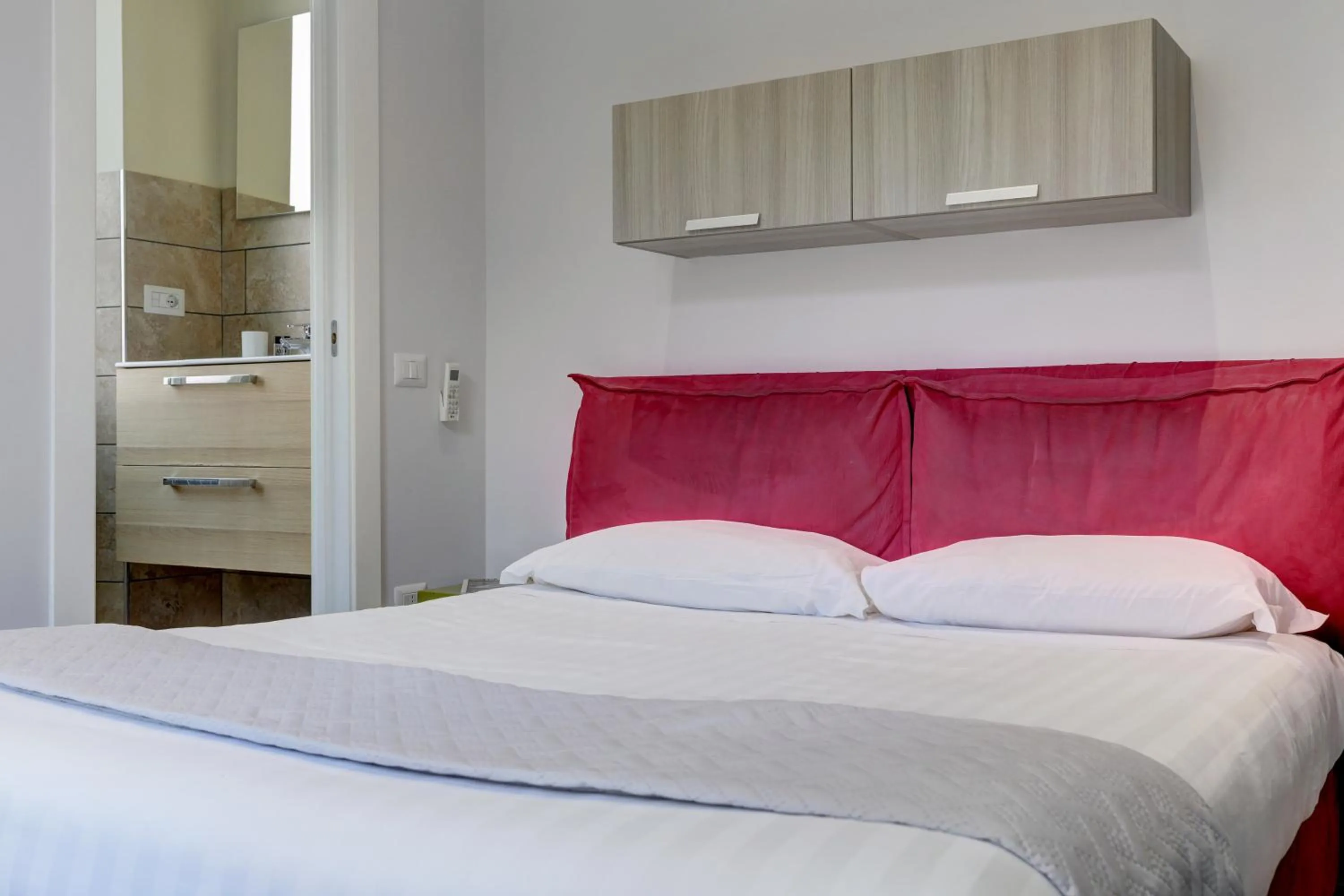 Bedroom, Bed in Appartamento Santi Quattro - Colosseo