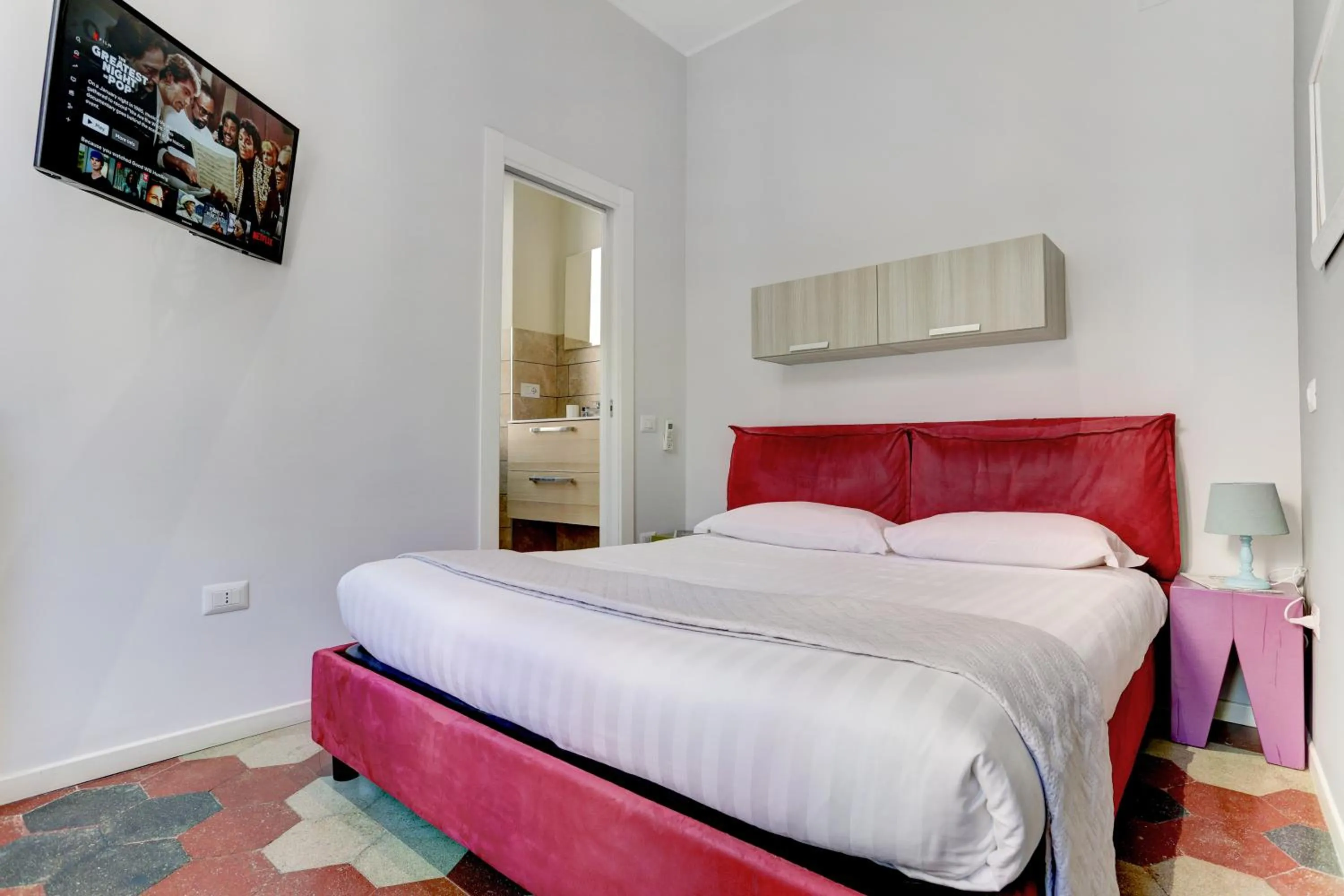 Bedroom, Bed in Appartamento Santi Quattro - Colosseo