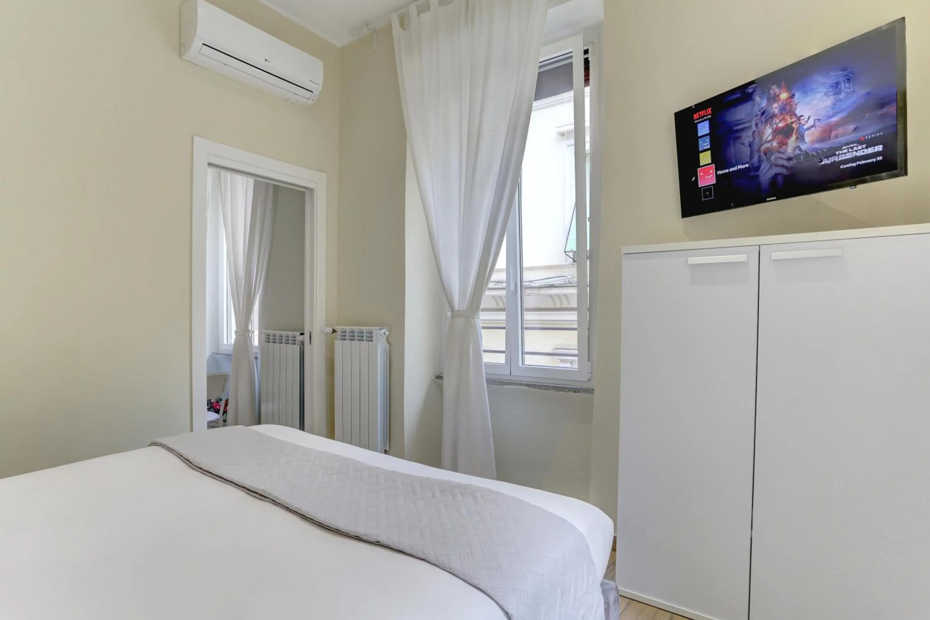 Bedroom, Bed in Appartamento Santi Quattro - Colosseo