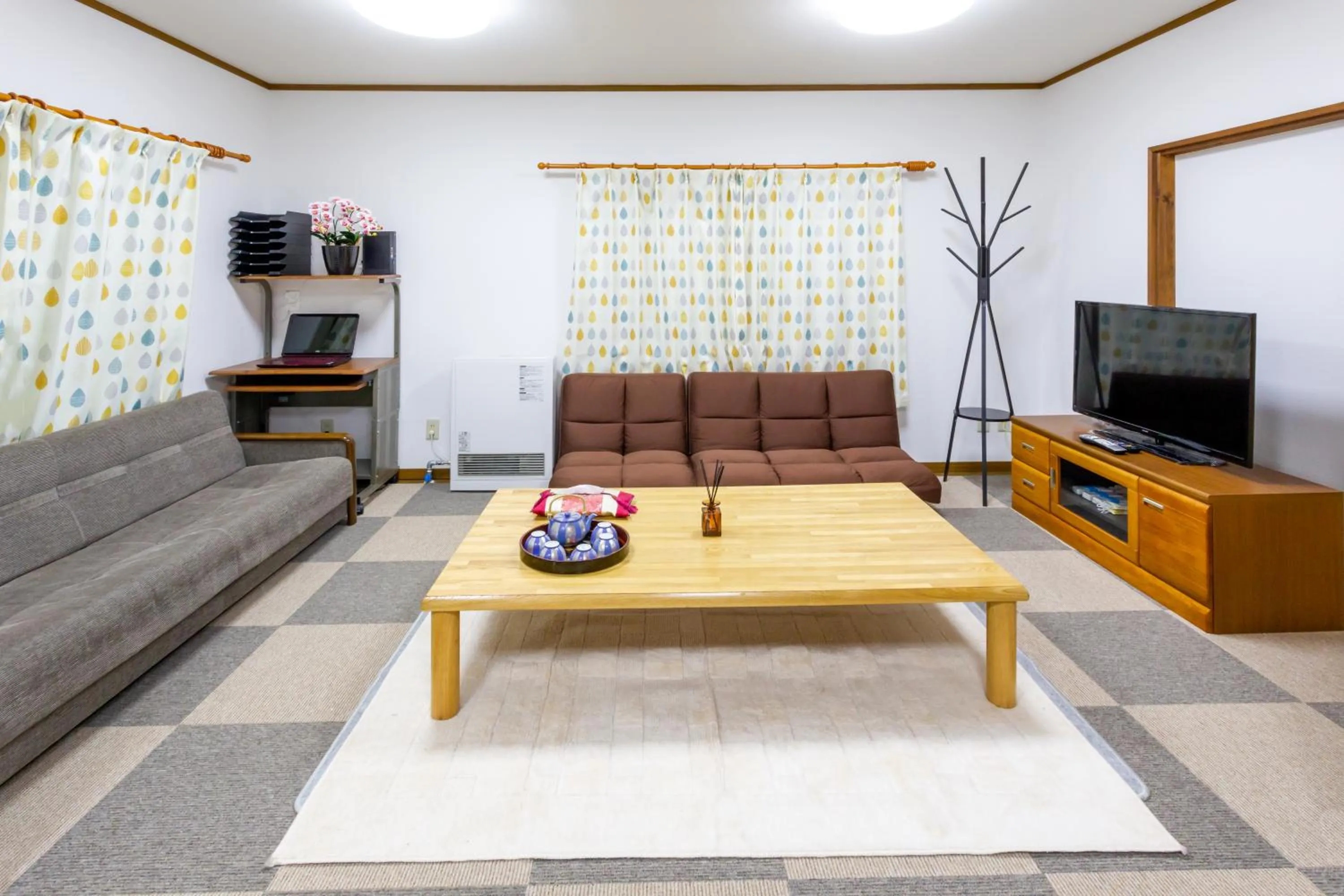 Communal lounge/ TV room in Pension Eastmountain Hakuba