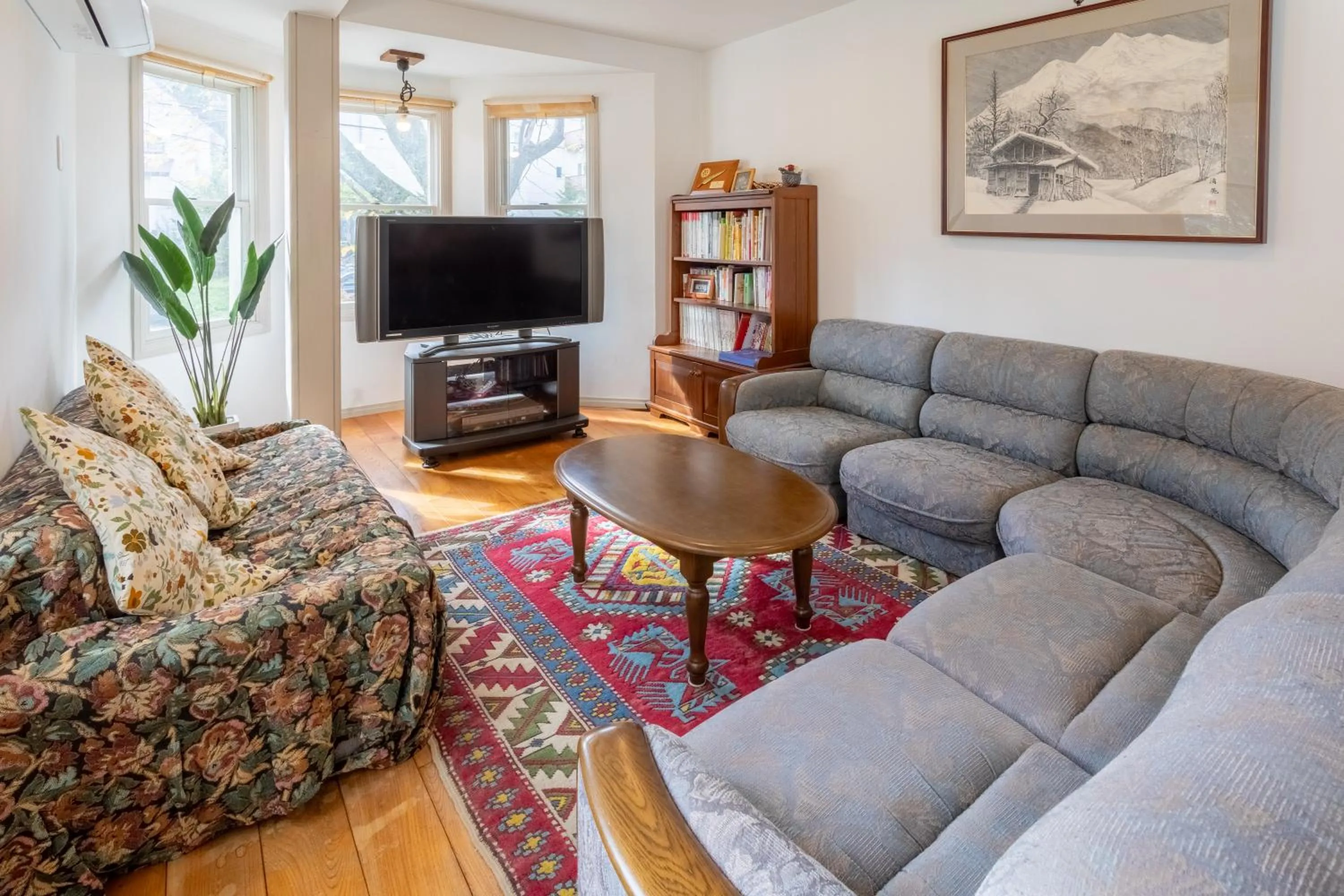 Communal lounge/ TV room in Pension Eastmountain Hakuba