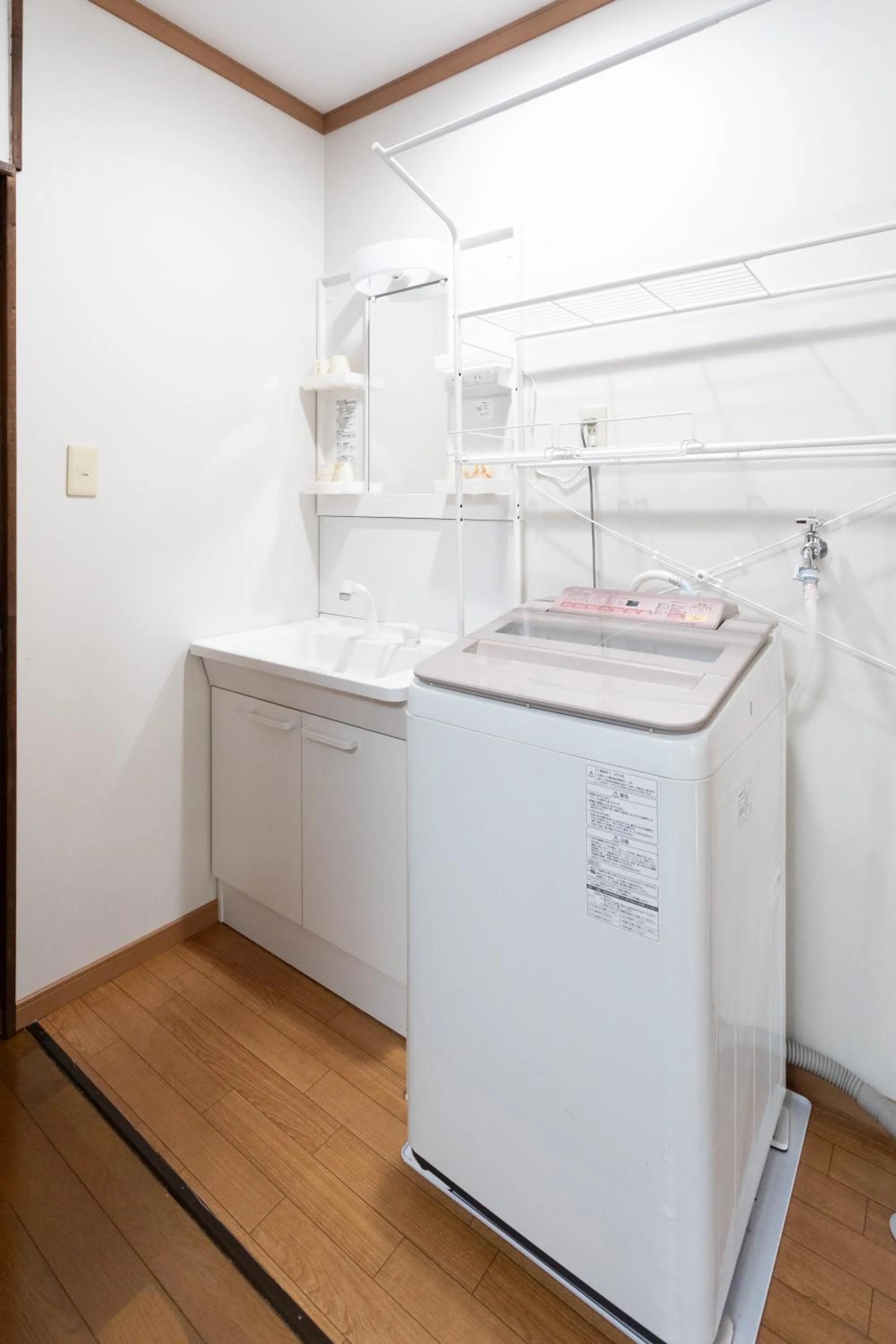 washing machine in Pension Eastmountain Hakuba