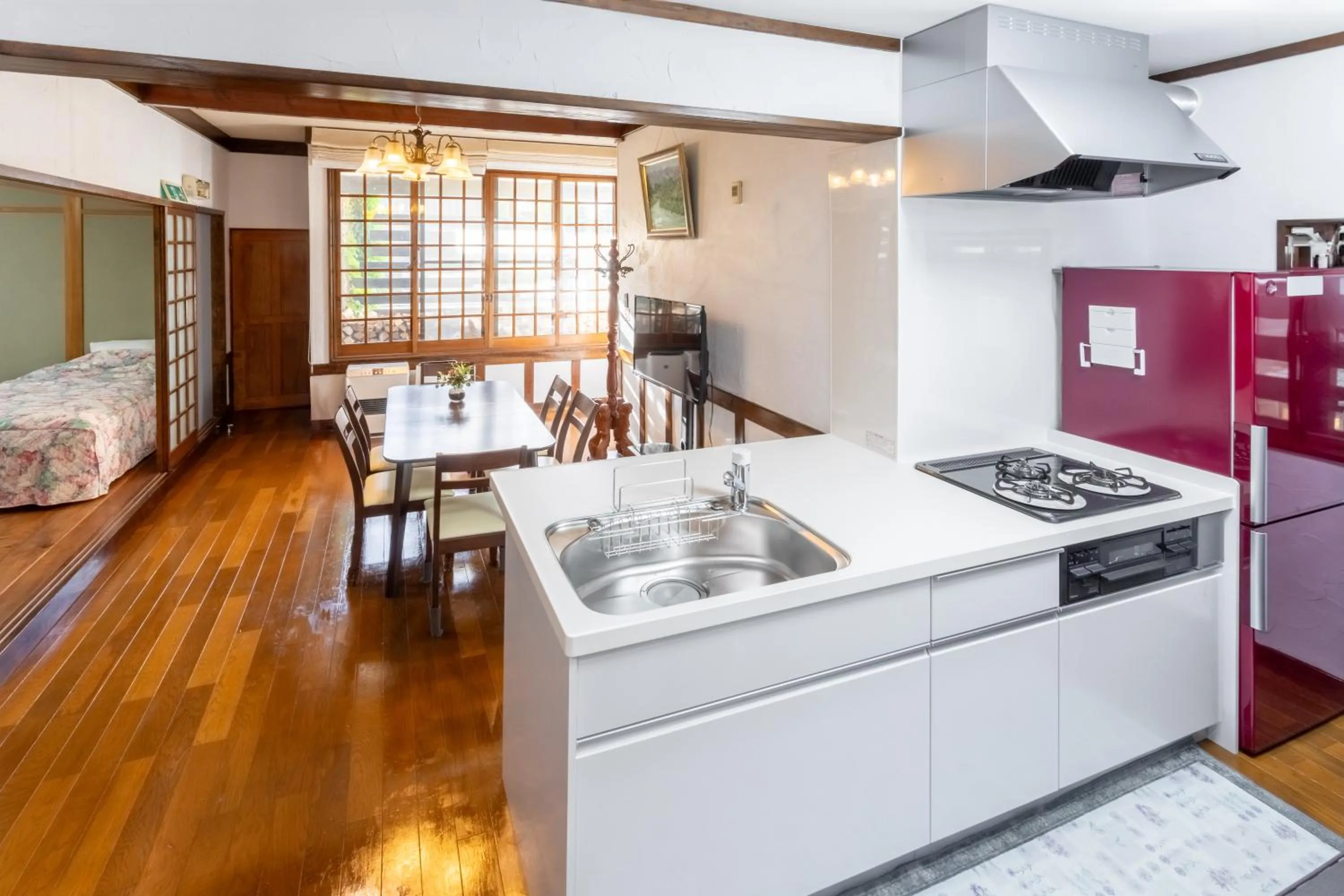 Kitchen or kitchenette, Bed in Pension Eastmountain Hakuba