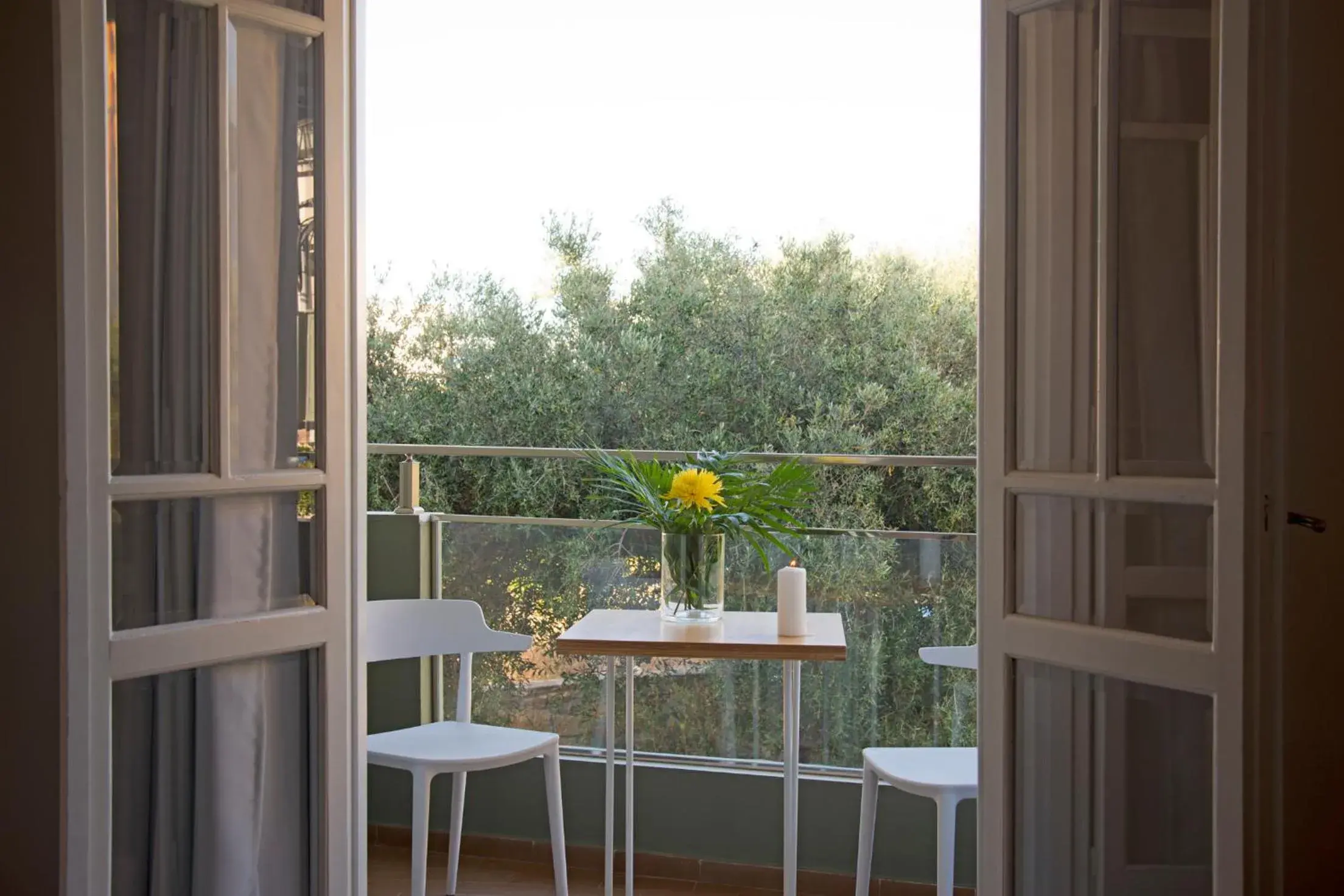 Triple Room with Balcony in Sunshine Studios Triple Room with Balcony in Sunshine Studios