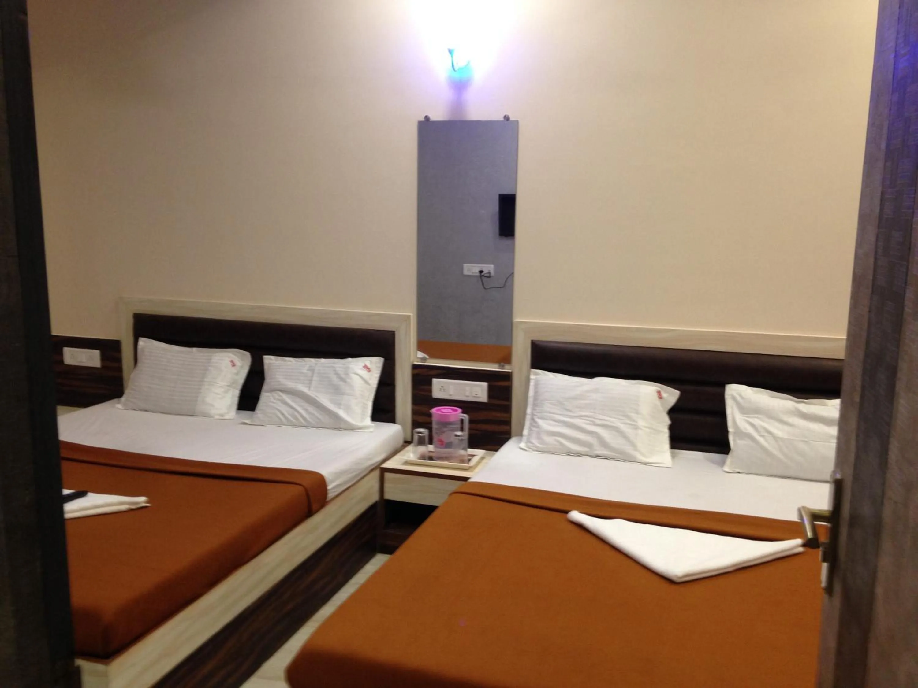 Photo of the whole room, Bed in Welcome Guest House