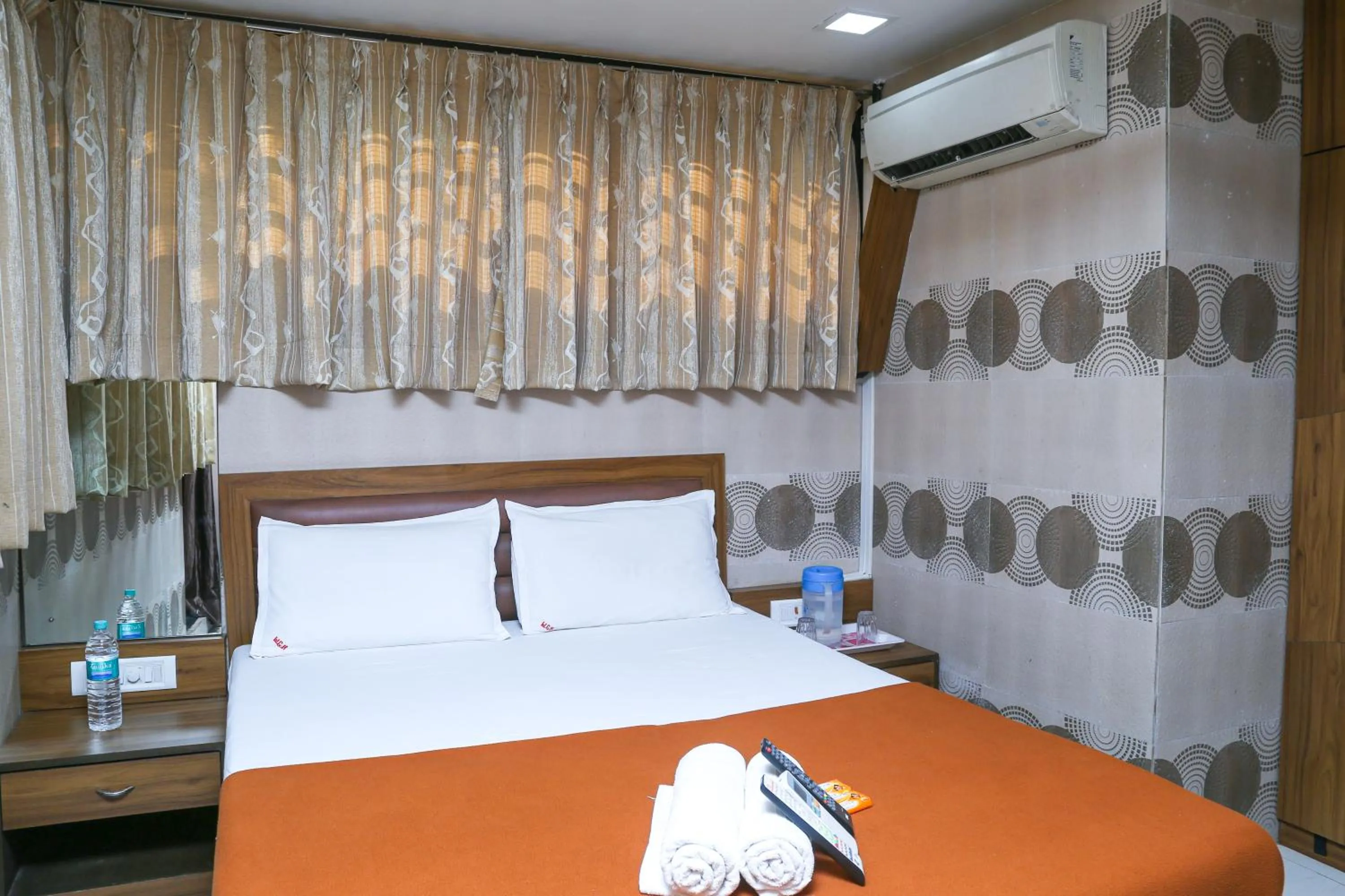 Bed in Welcome Guest House