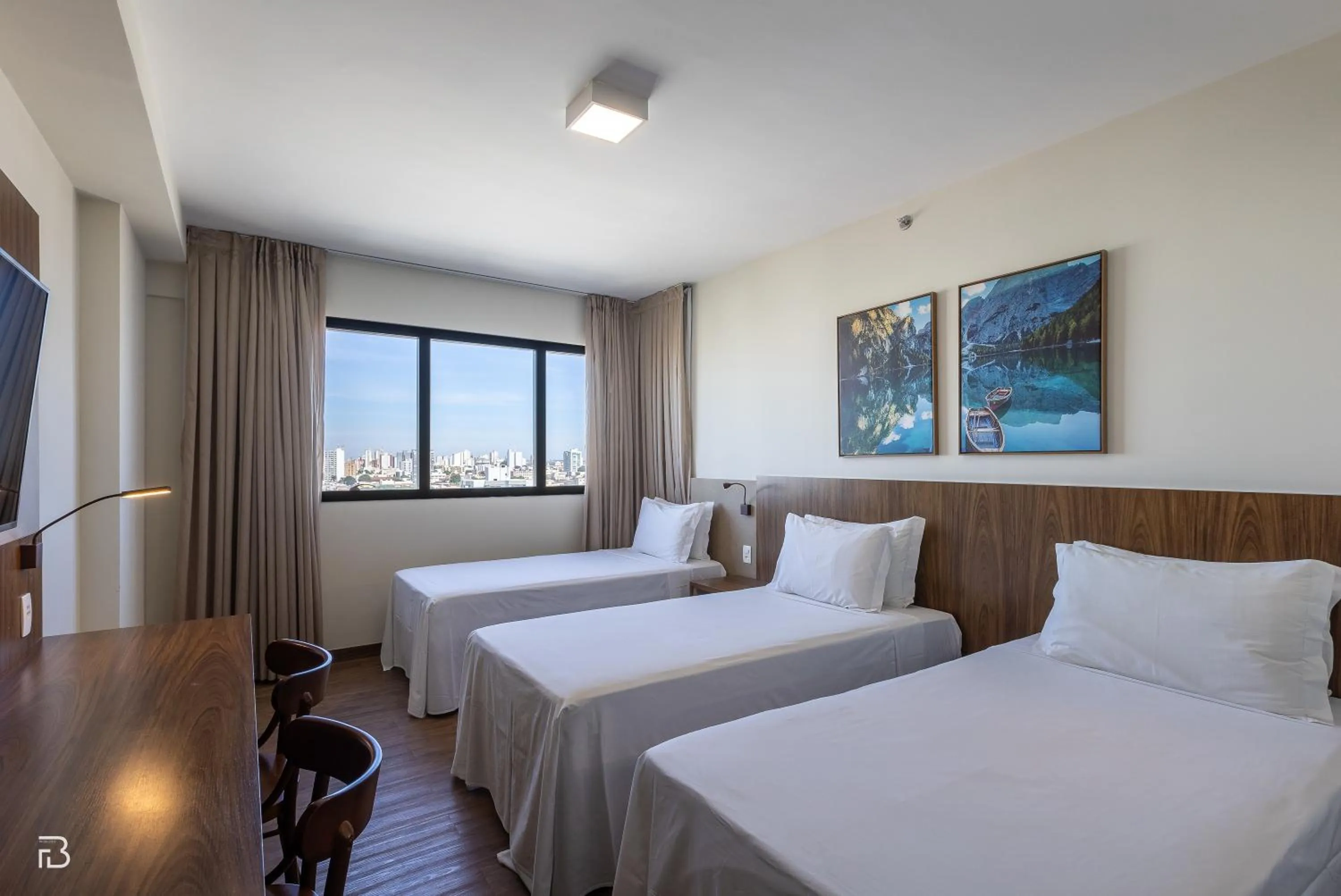 Photo of the whole room, Bed in Gran Executive Hotel