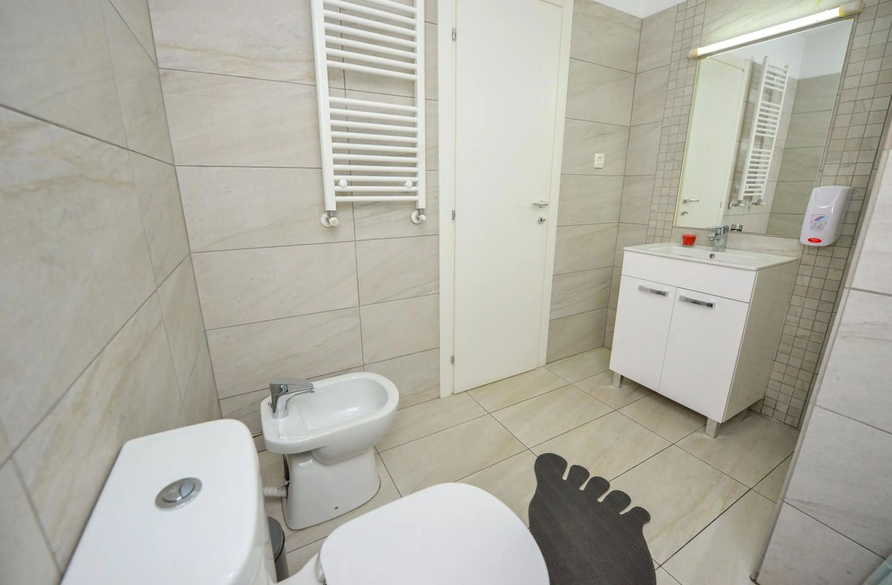 Bathroom in Harmony Suites