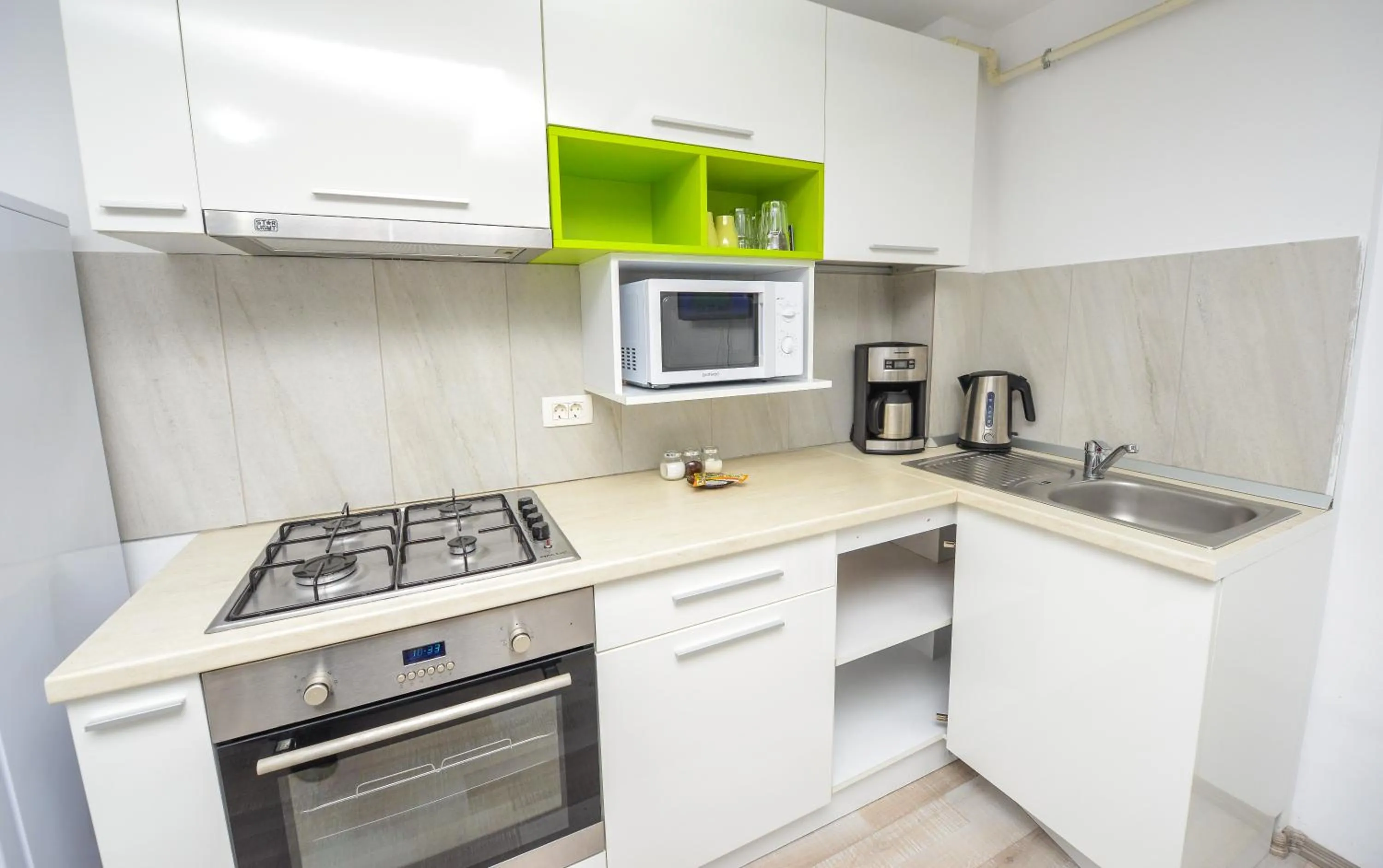 Kitchen or kitchenette in Harmony Suites