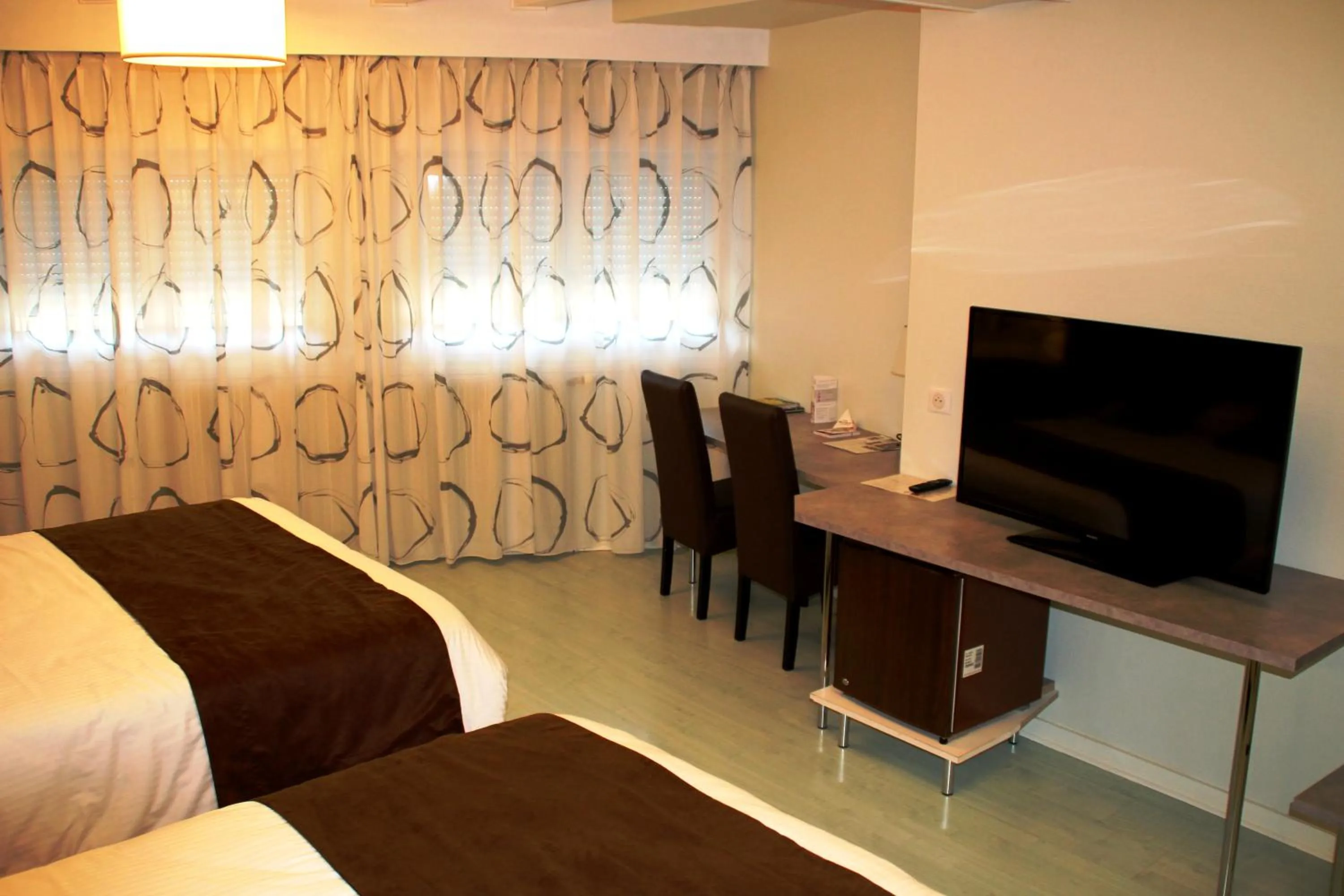 Photo of the whole room, Bed in Hôtel Saint-Hubert