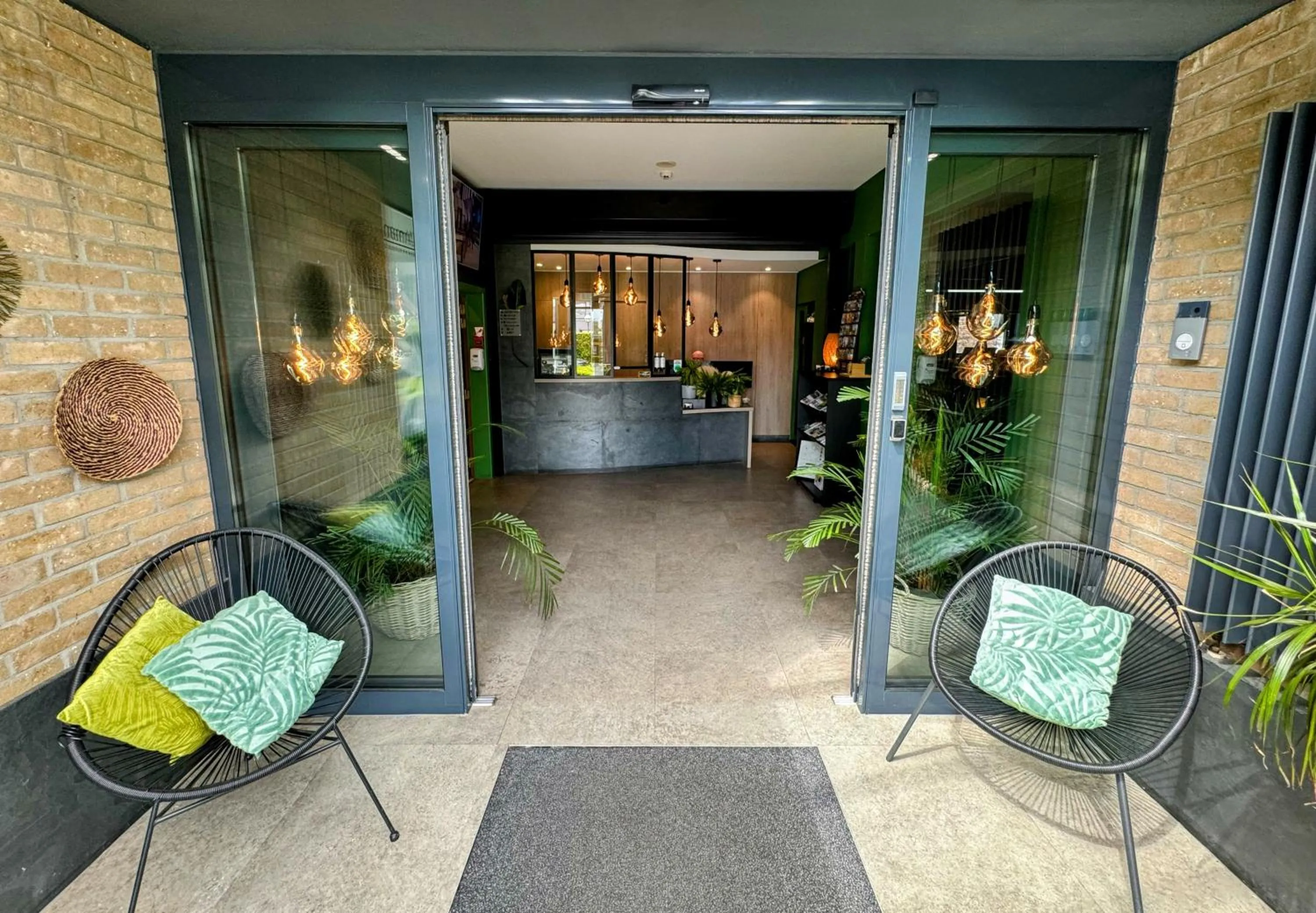 Lobby or reception in Hôtel L'Amandier