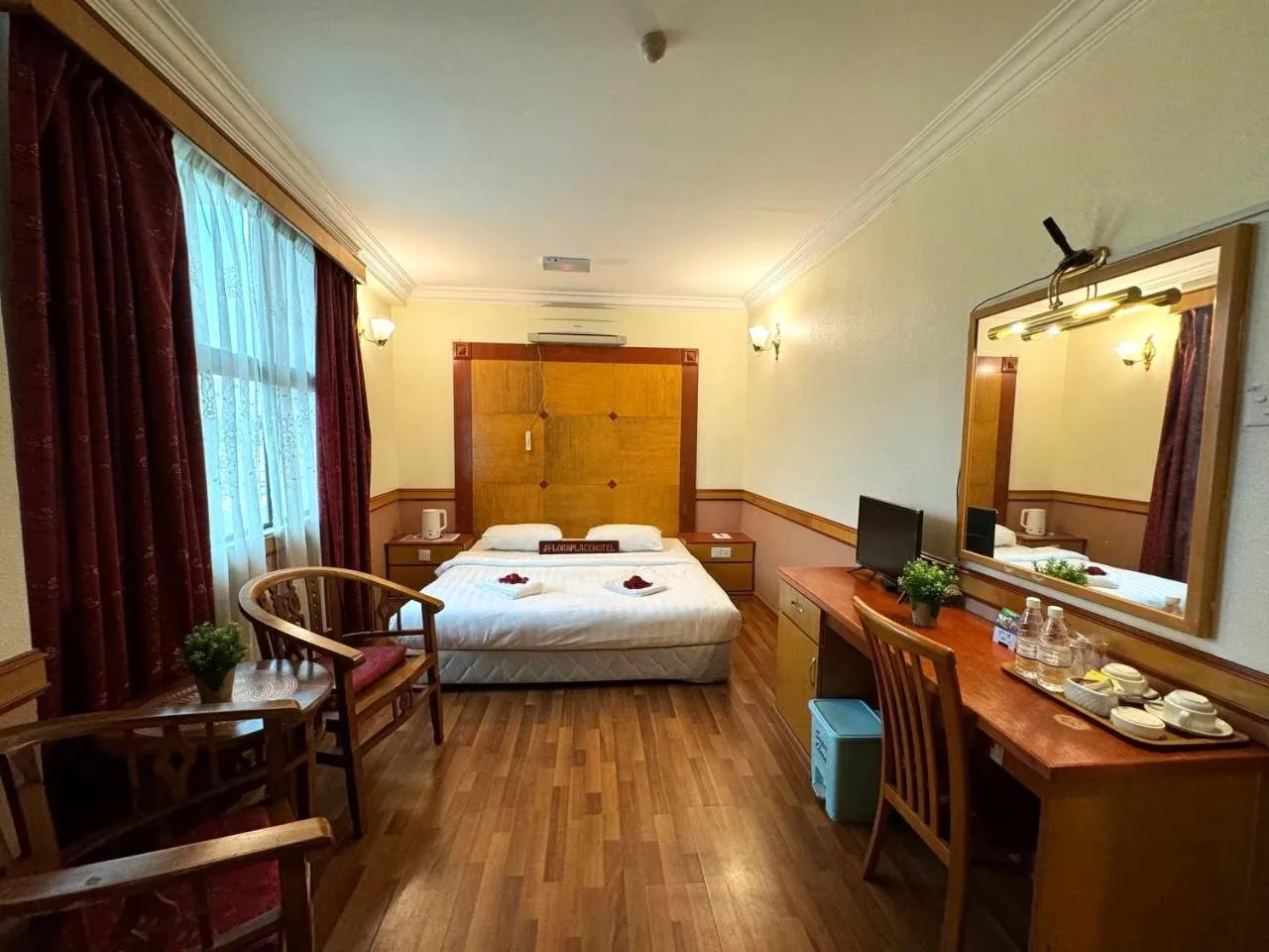 Bed in Flora Place Hotel